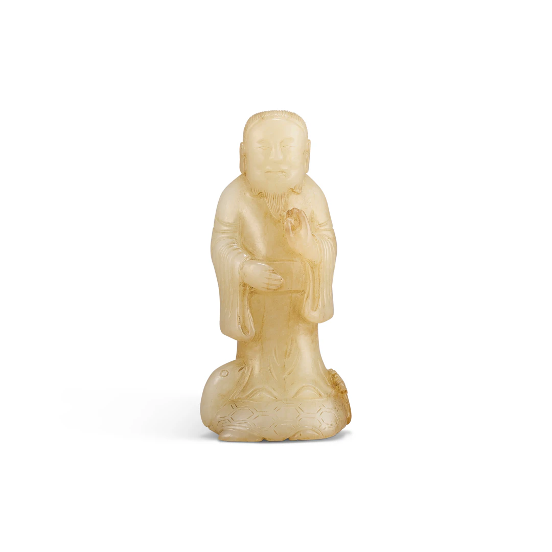A Small White Jade Figure of Zhengwu