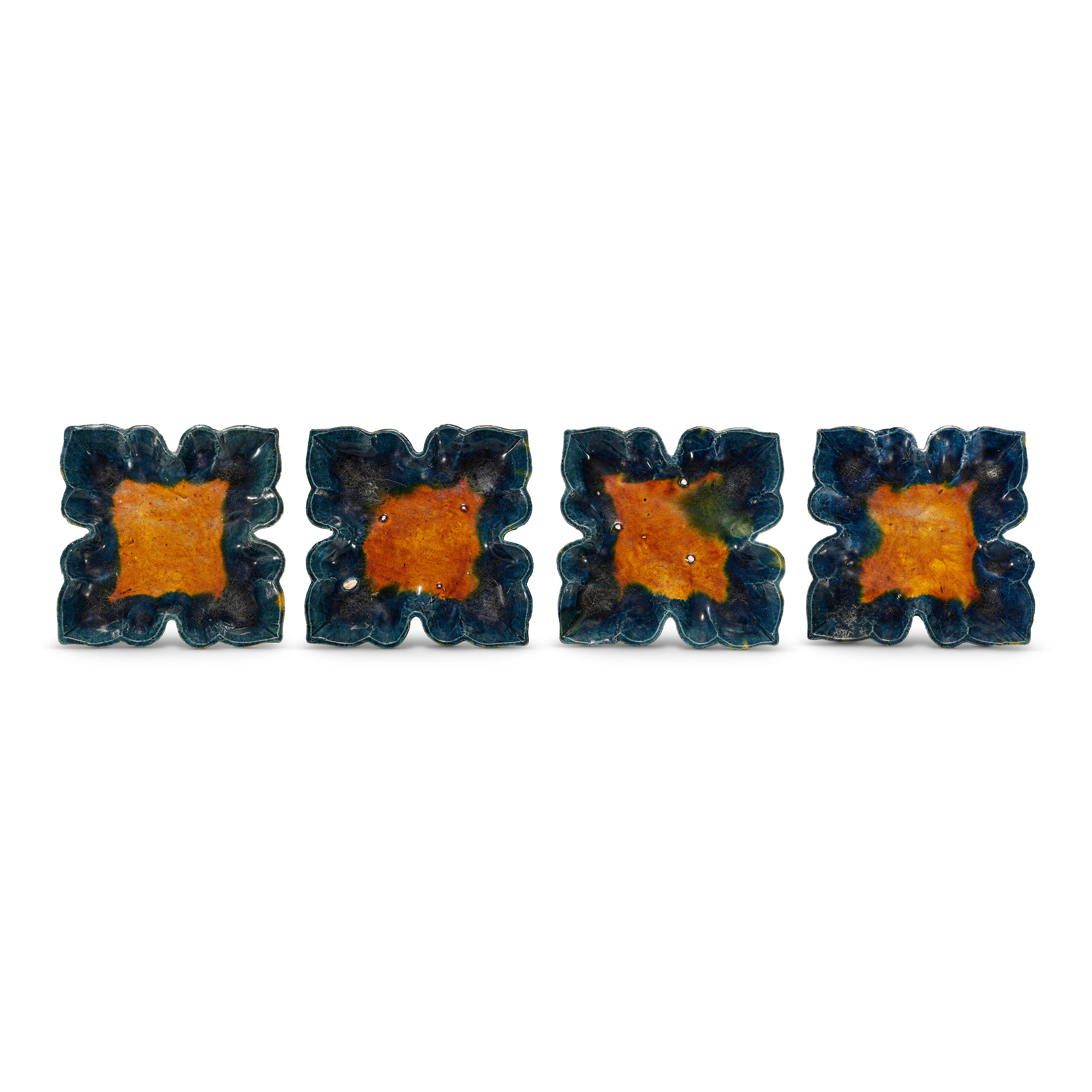 A Set of Four Sancai and Blue-Glazed Foliate Dishes
