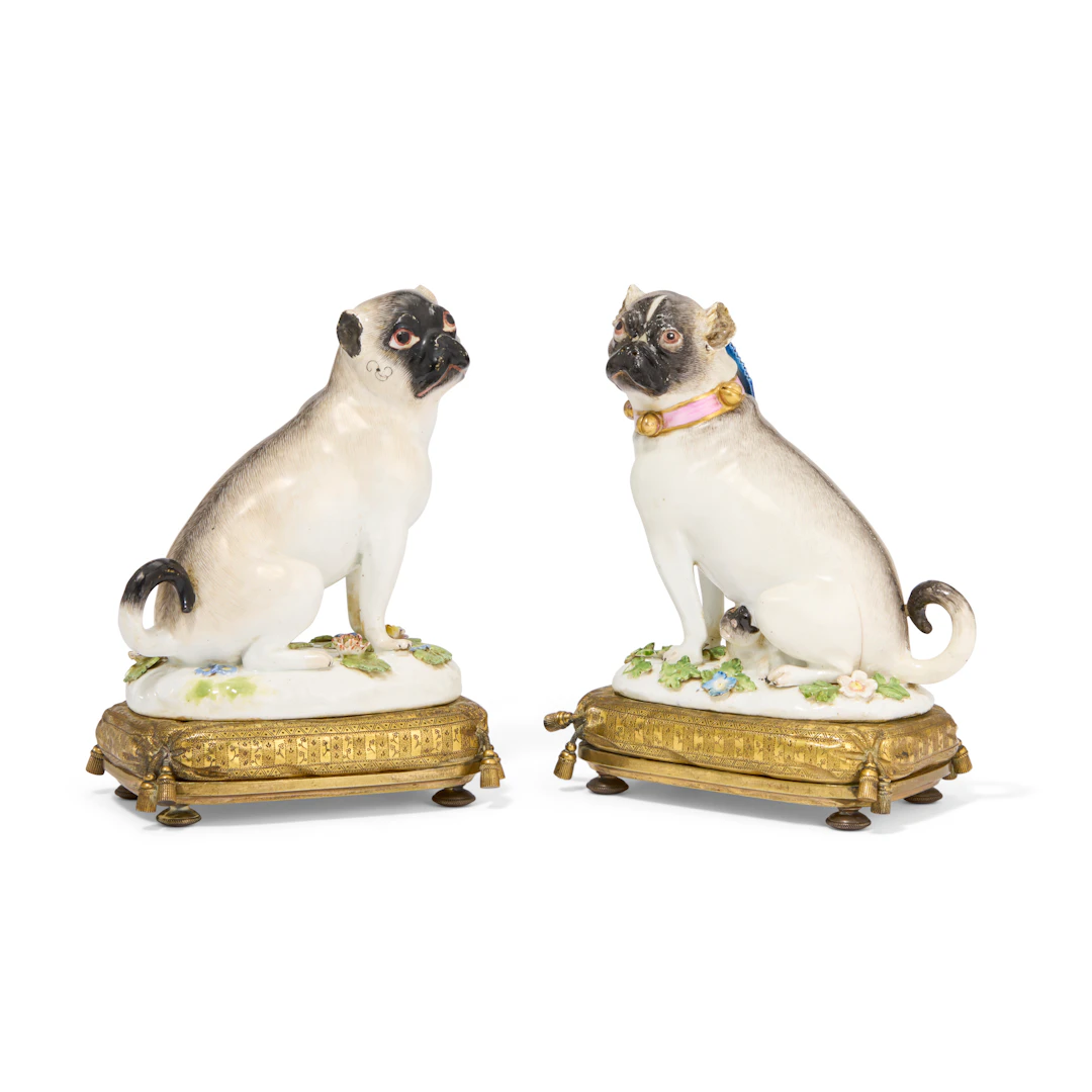 Two Gilt-Metal-Mounted Meissen Porcelain Models of Pugs
