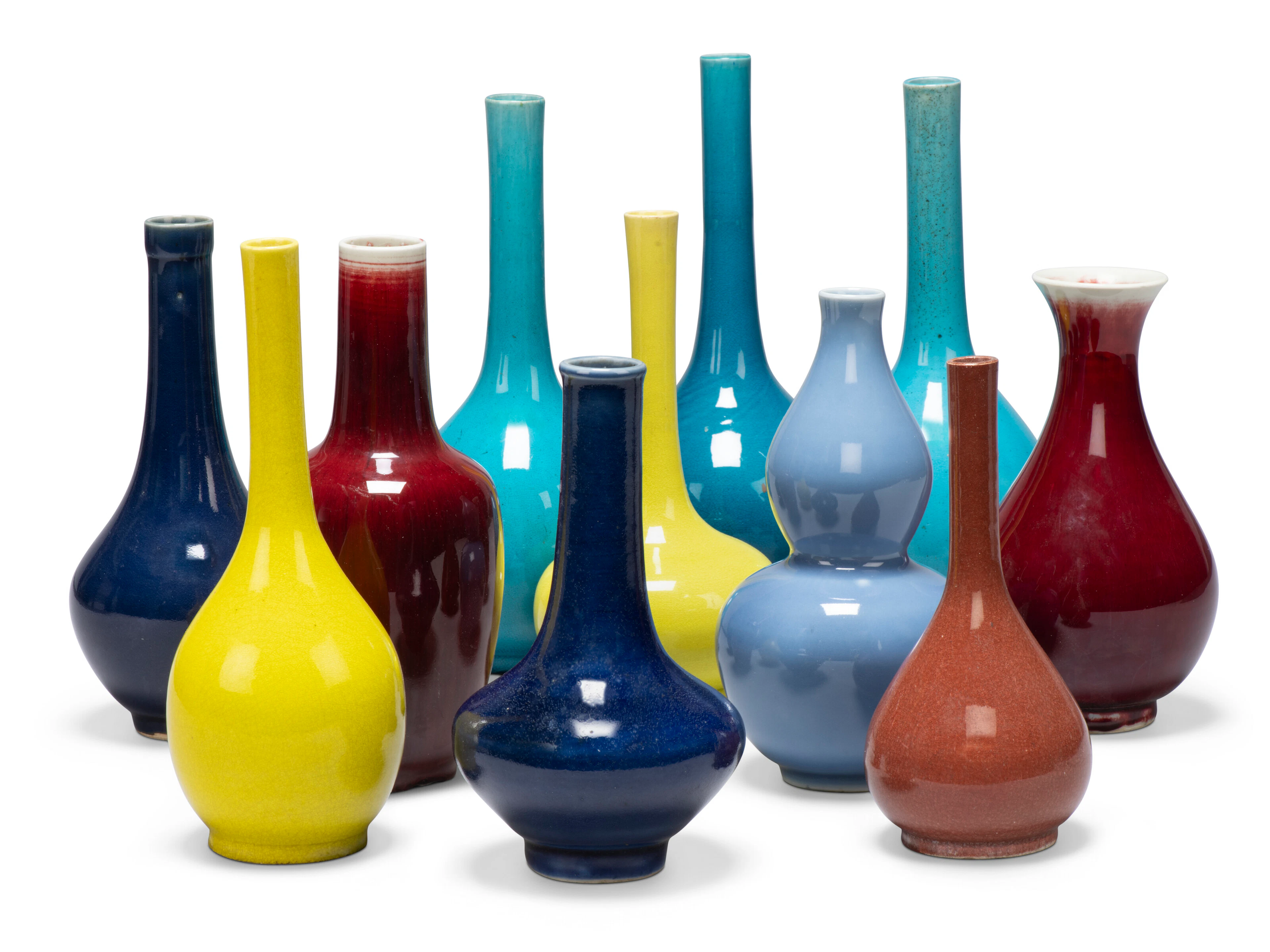 A Group of Eleven Chinese Monochrome Glazed Bottle Vases