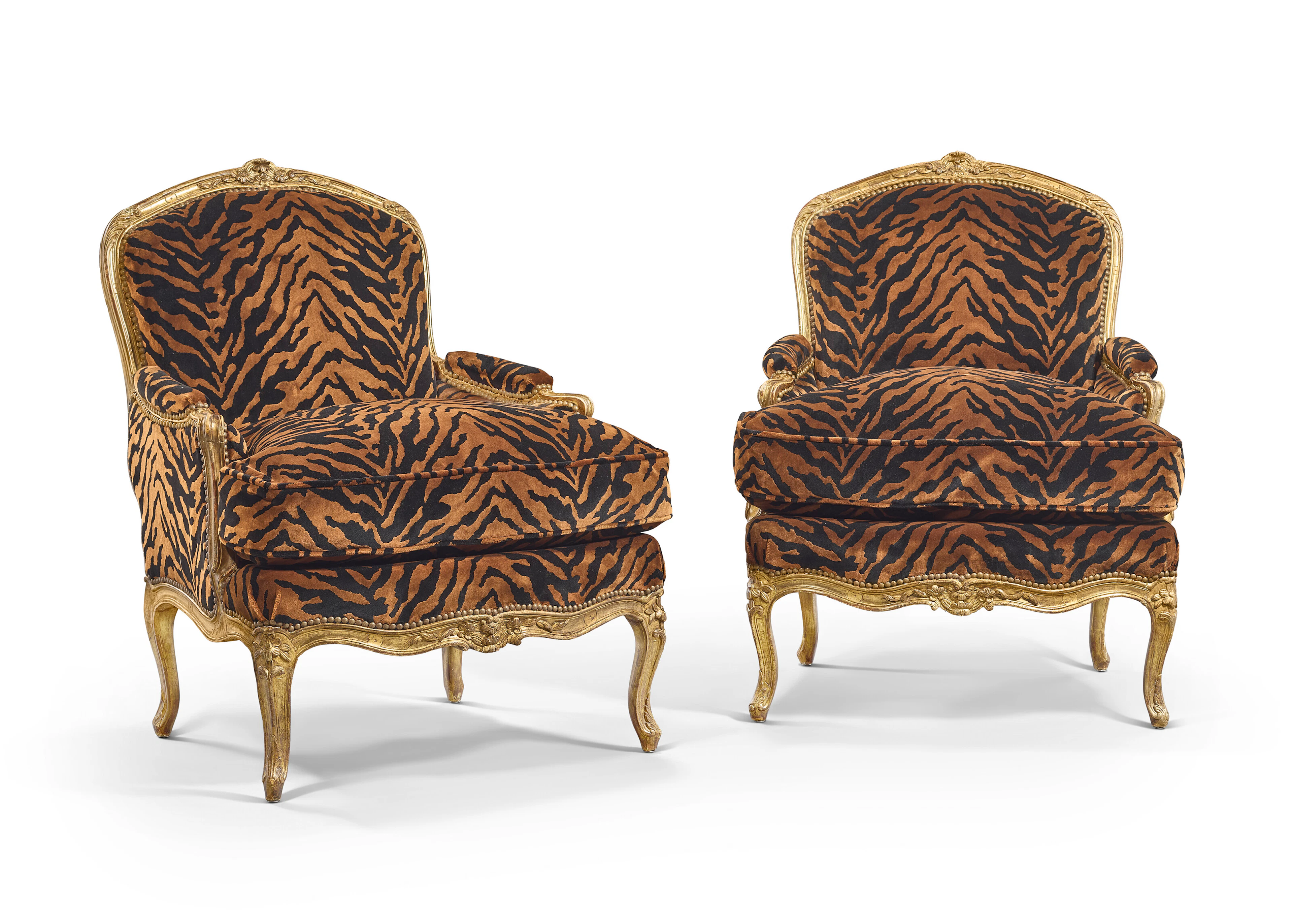 A Pair of Louis Xv Giltwood Bergeres