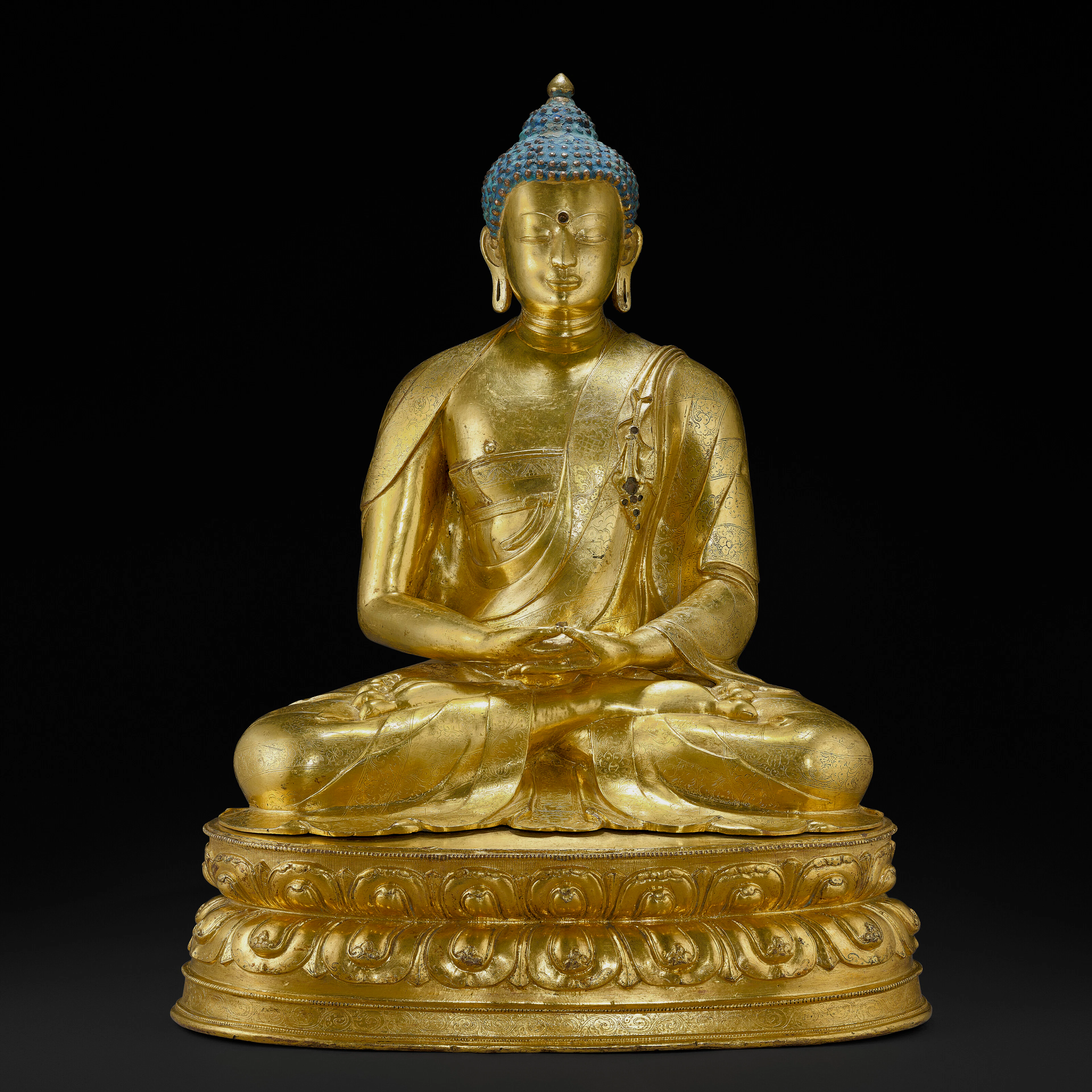 A Gilt Copper Alloy Figure of Amitabha