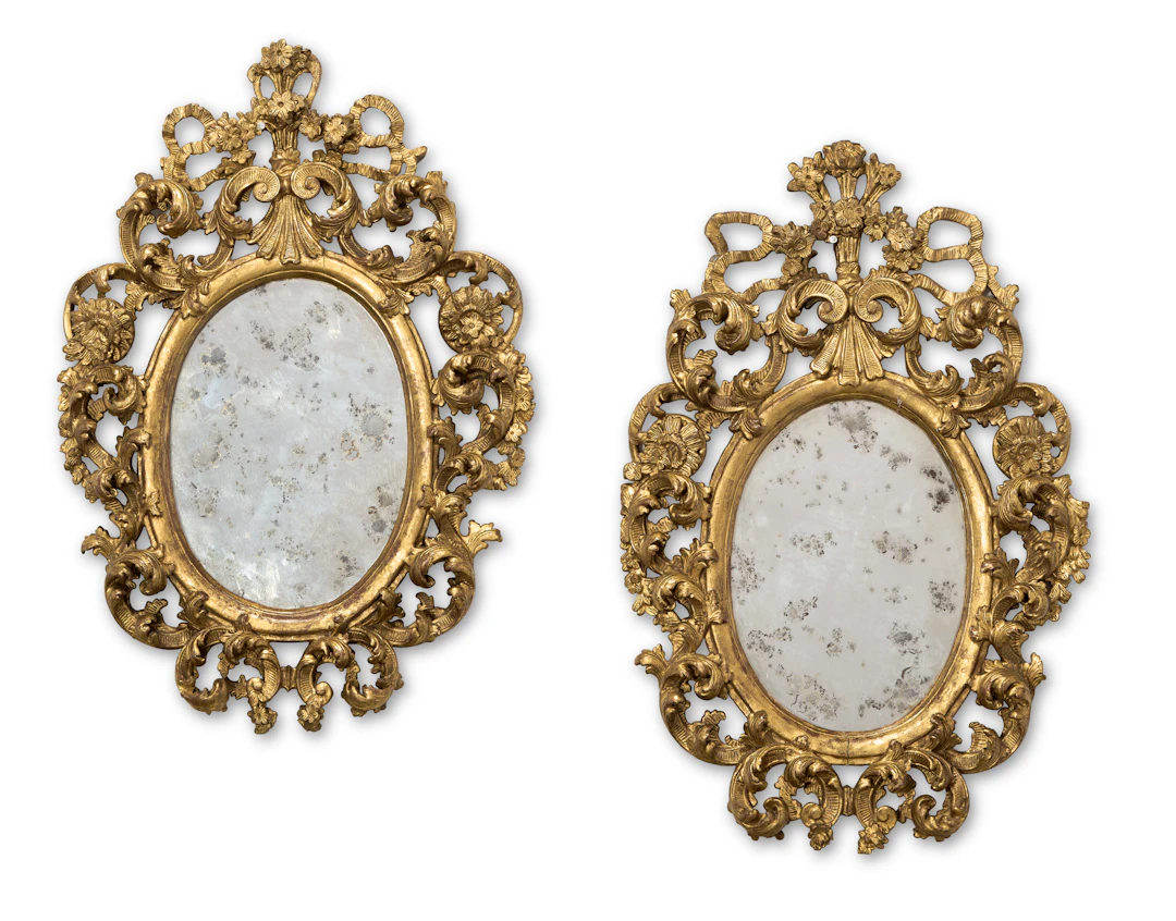 A Pair of North Italian Giltwood Mirrors