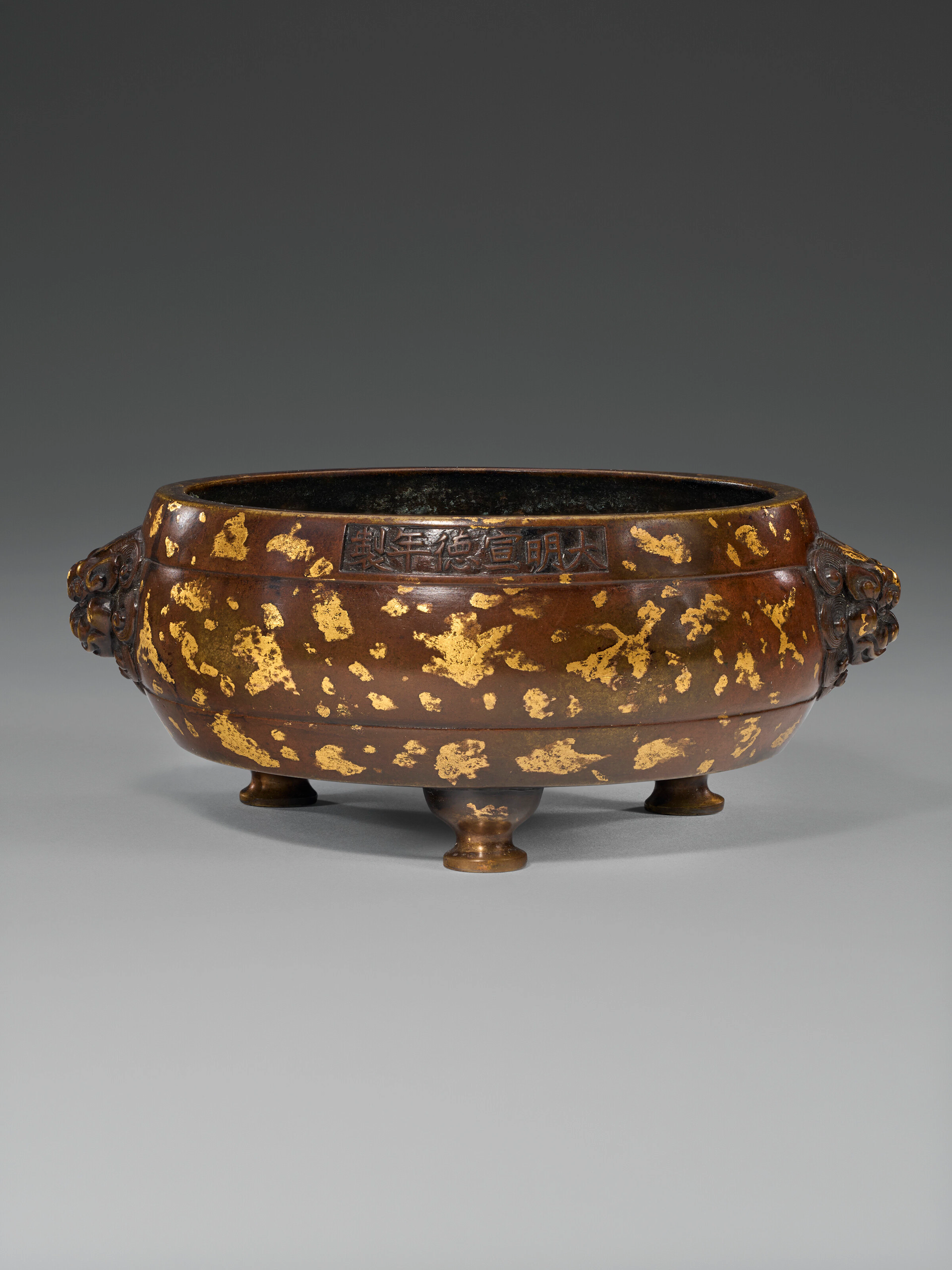 A Gold-Splashed Bronze Tripod Censer