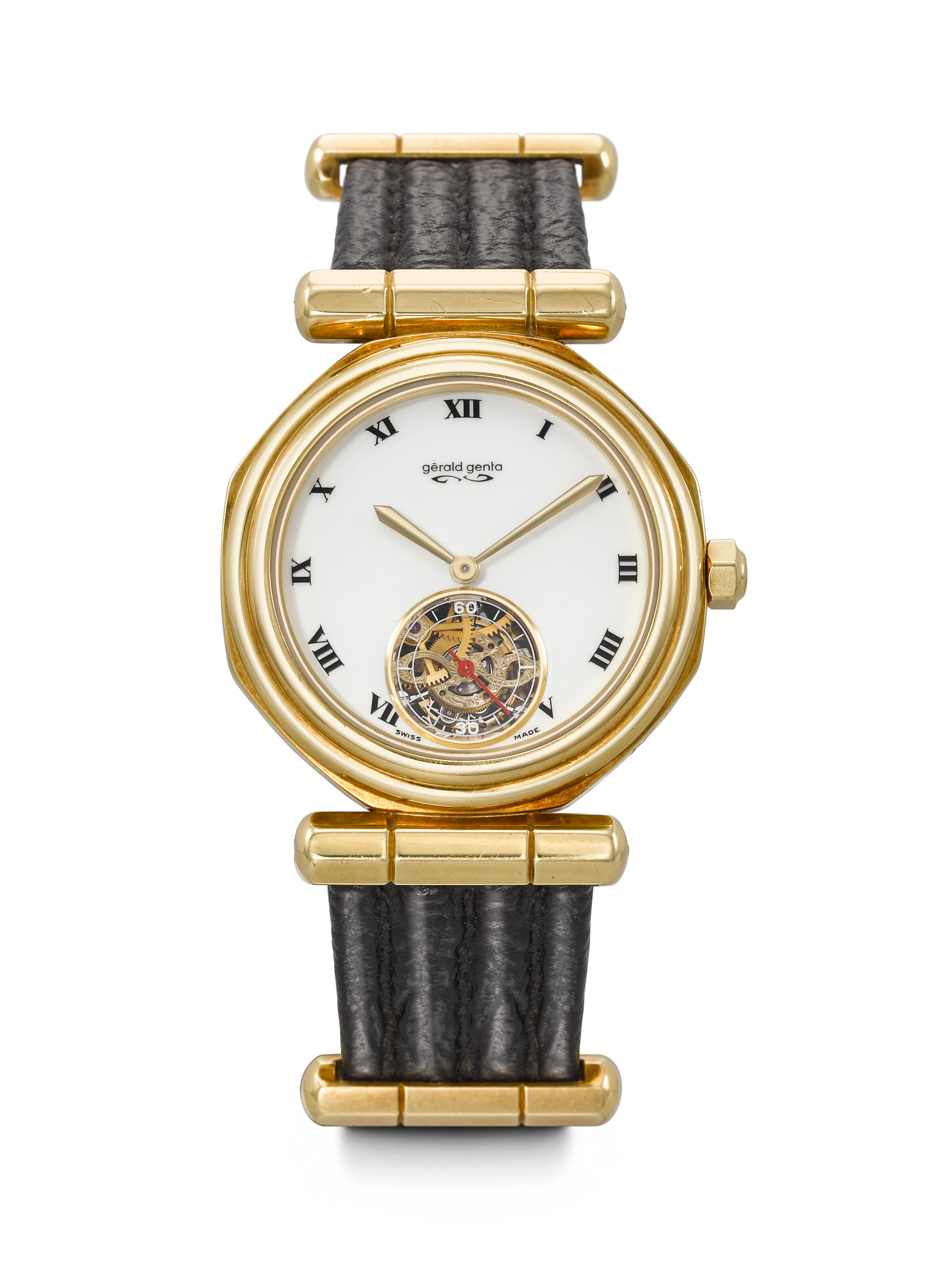 GERALD GENTA. A RARE AND HIGHLY ATTRACTIVE 18K GOLD AUTOMATIC TOURBILLON