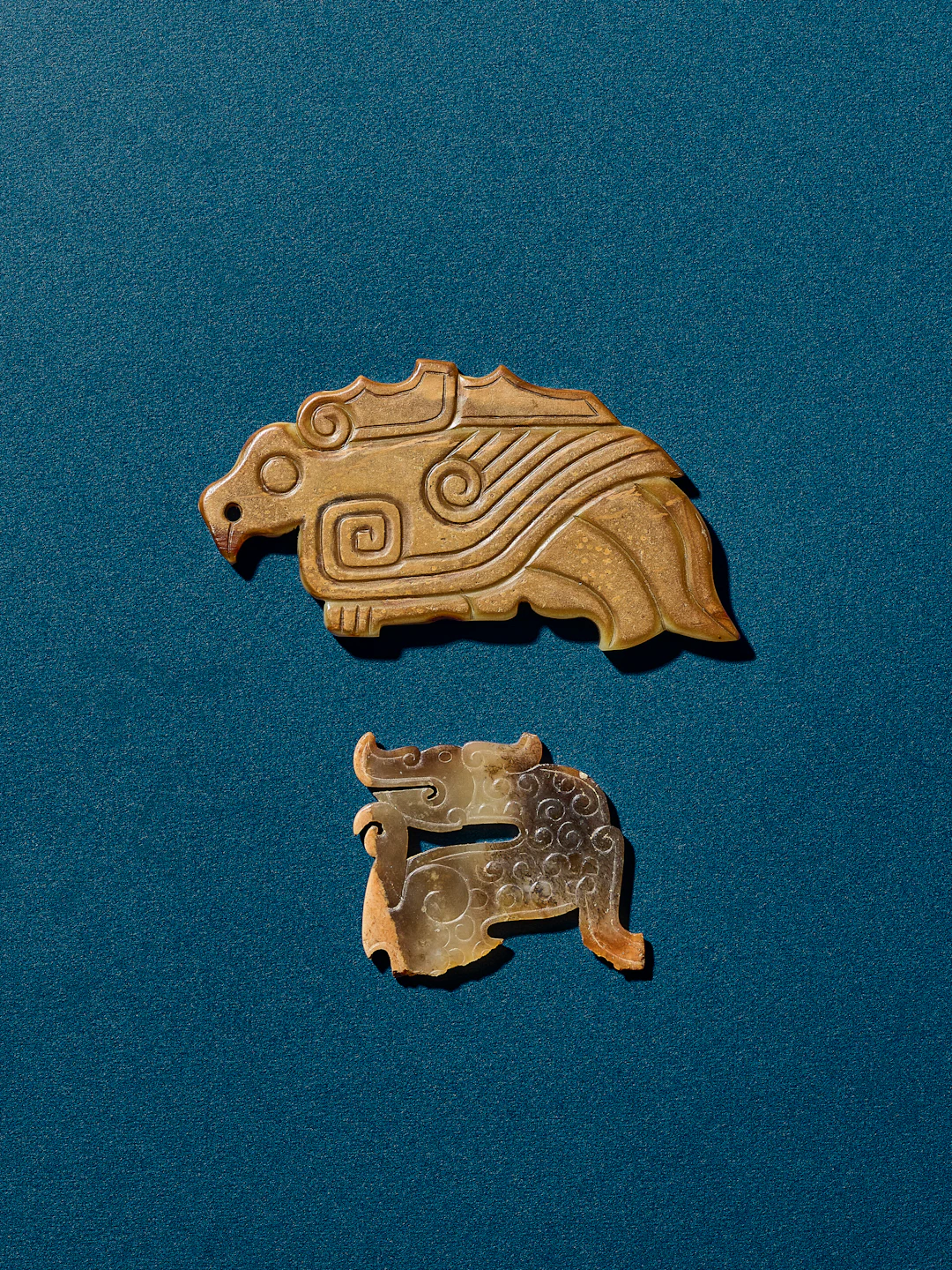 A Jade Fragment of 'Dragon' Pendant and a Jade 'Bird' Pendant