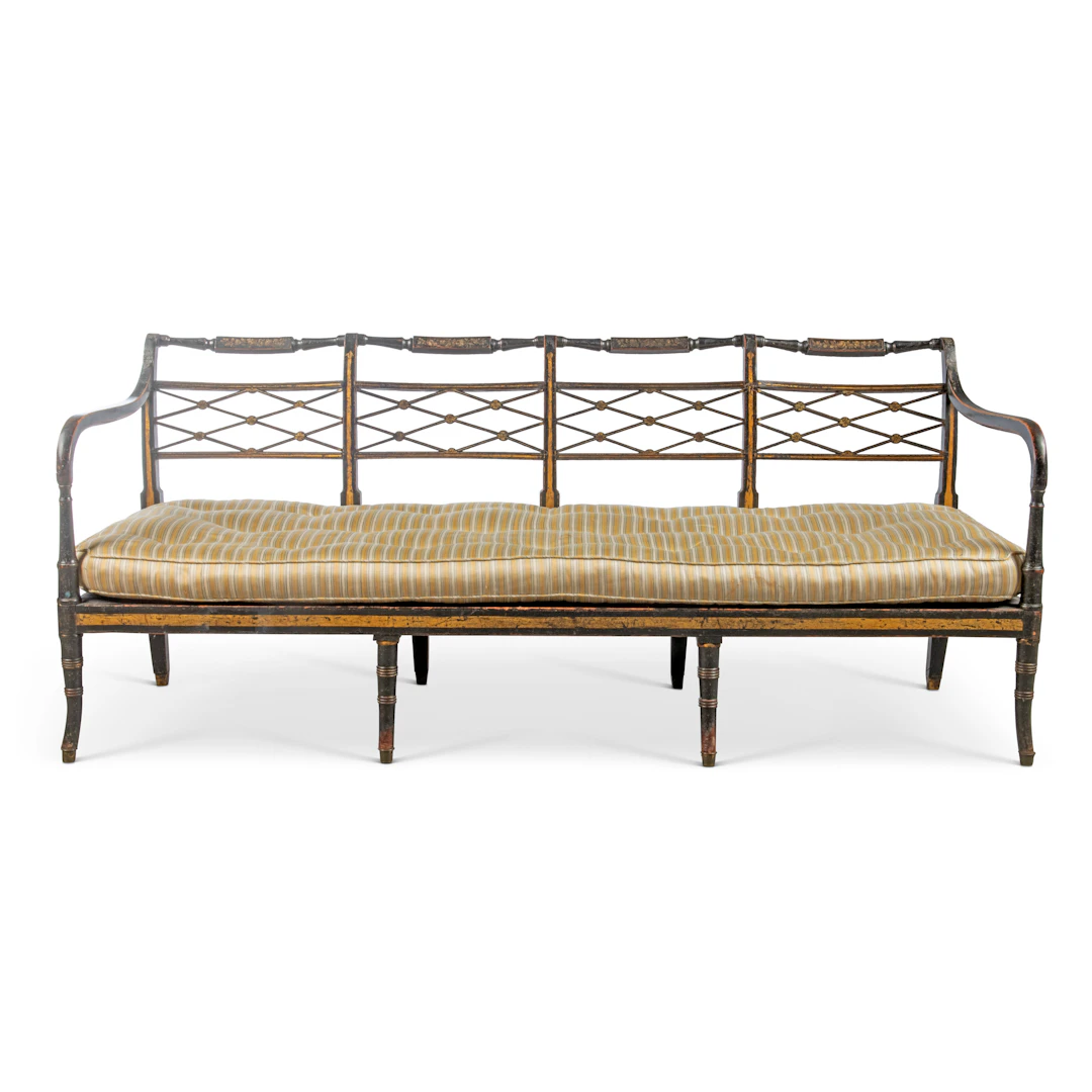 A Regency Parcel-Gilt, Painted and Ebonised Settee