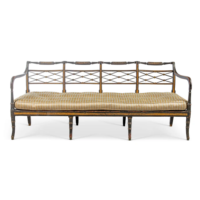 A Regency Parcel-Gilt, Painted and Ebonised Settee