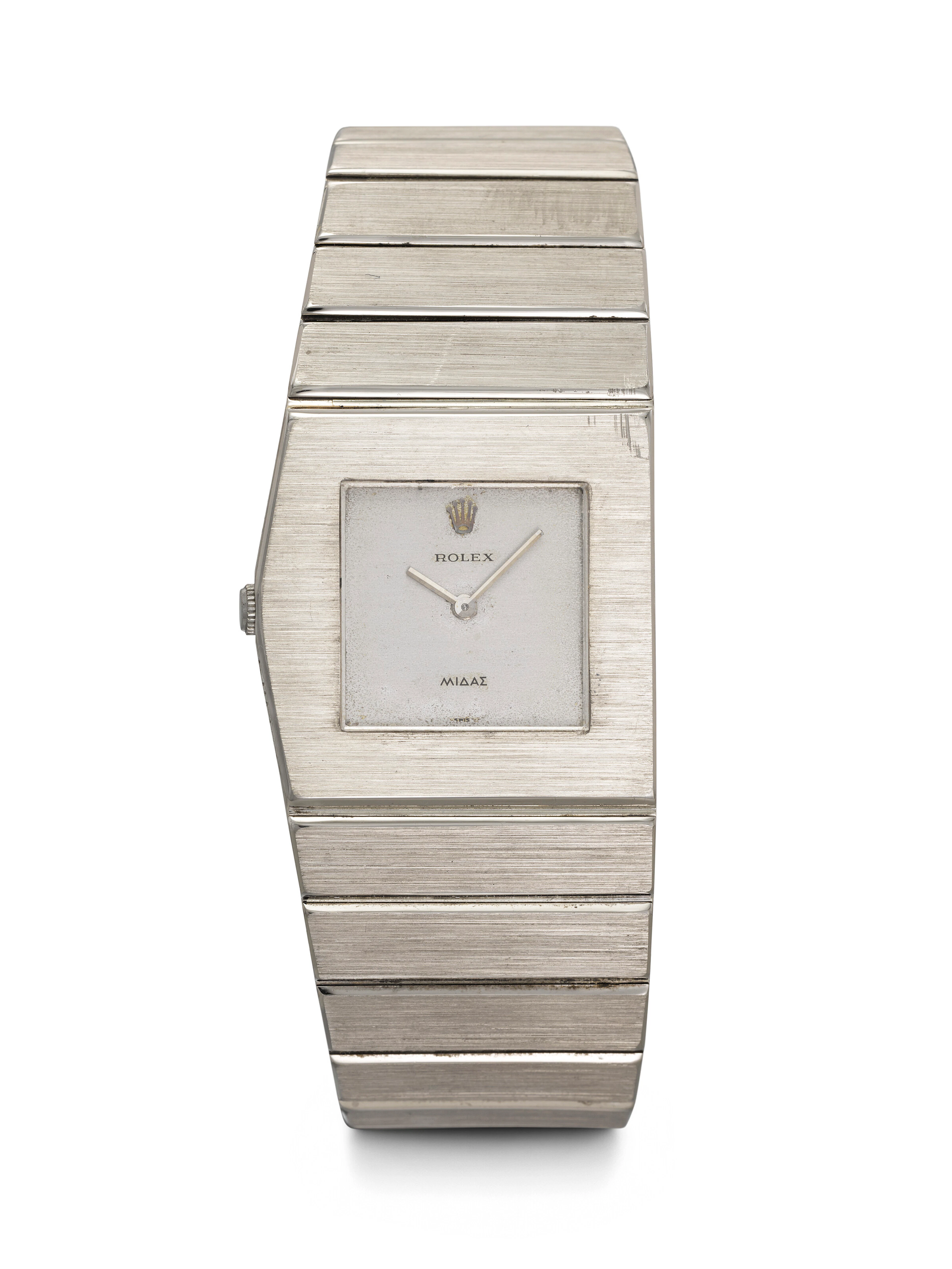 ROLEX. AN EXTREMELY RARE AND HEAVY 18K WHITE GOLD ASYMMETRIC LEFT