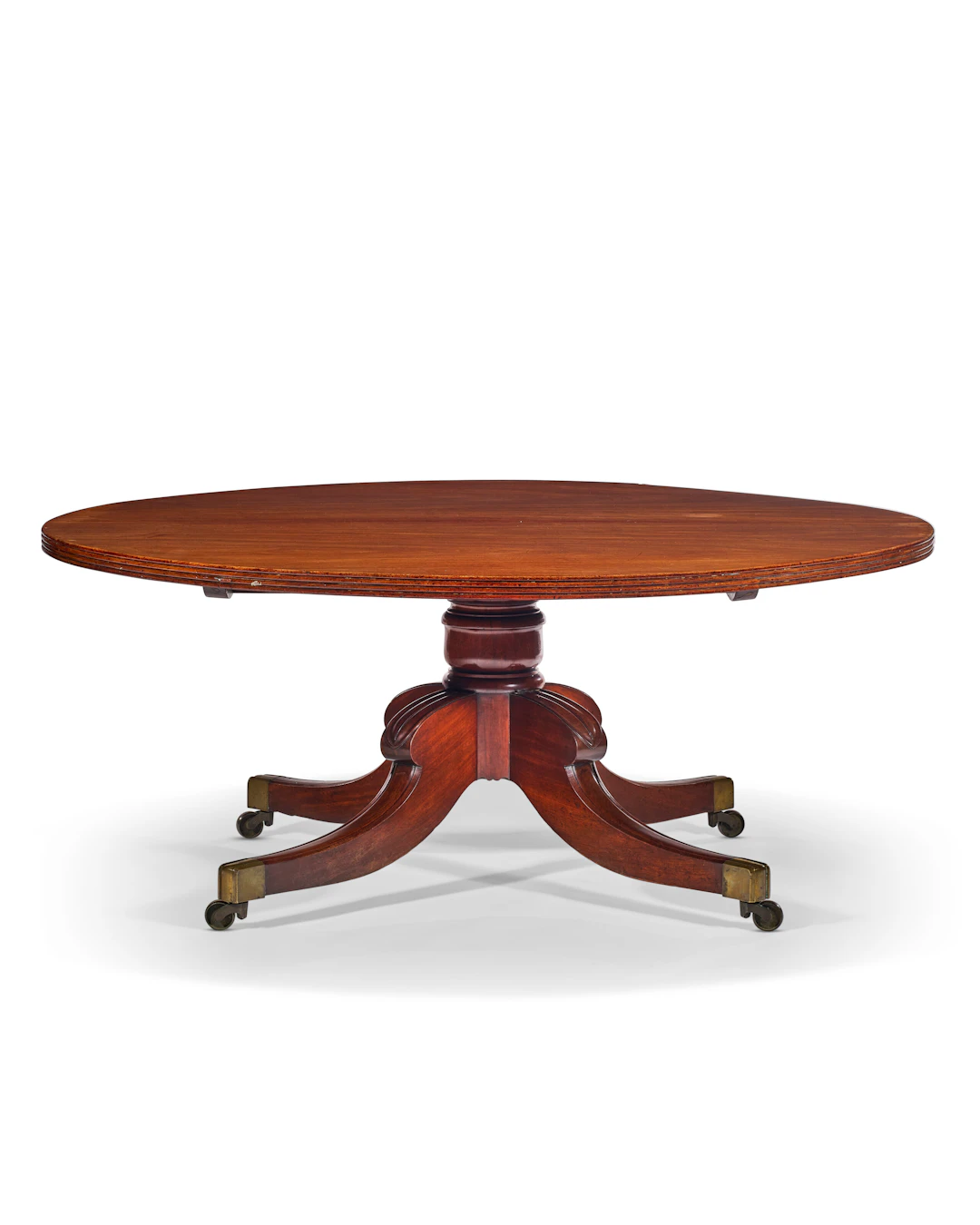 A Large Regency Mahogany Circular Tilt-Top Dining Table