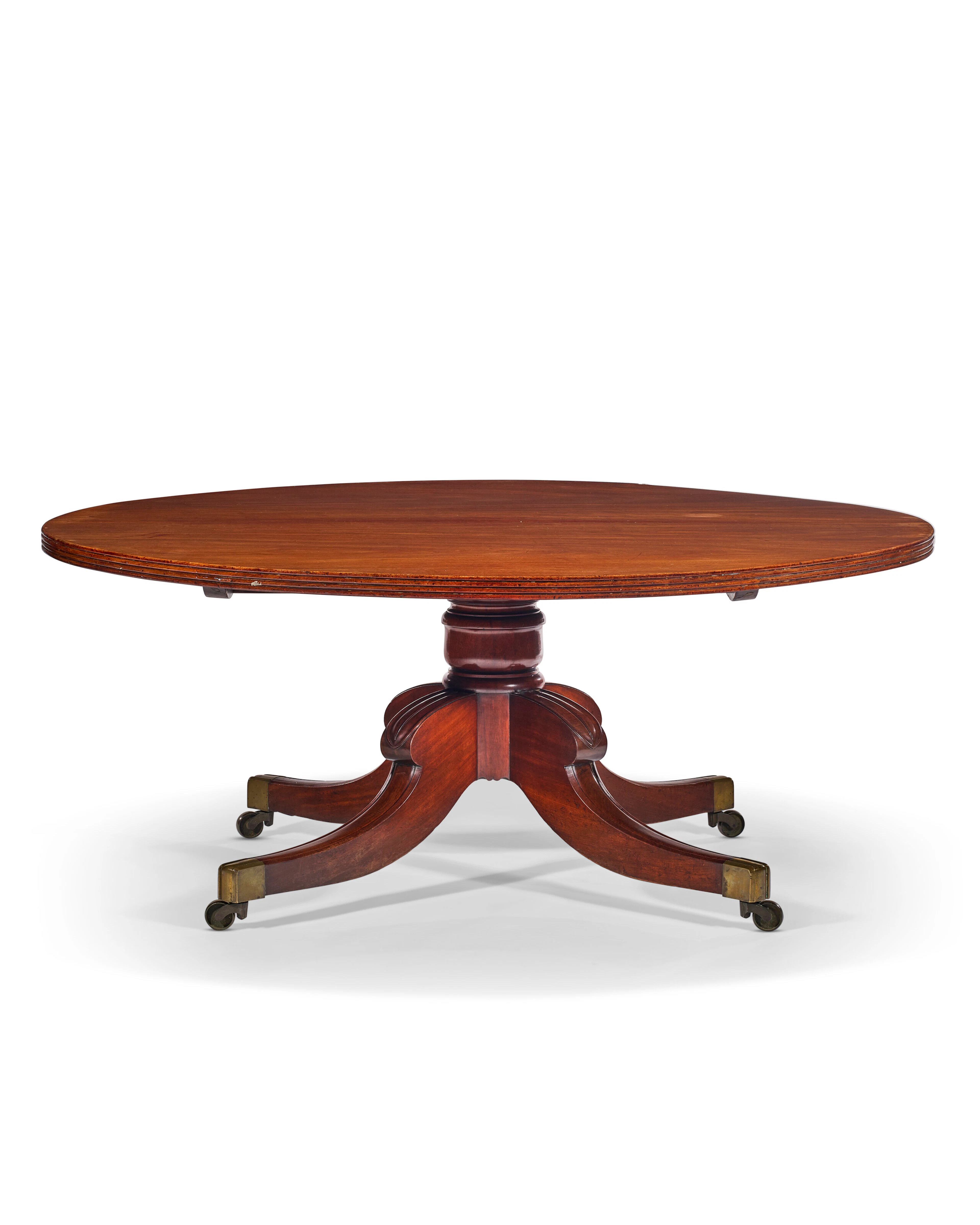 A Large Regency Mahogany Circular Tilt-Top Dining Table
