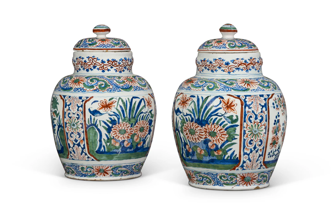 A Pair of Dutch Delft Polychrome Jars and Covers