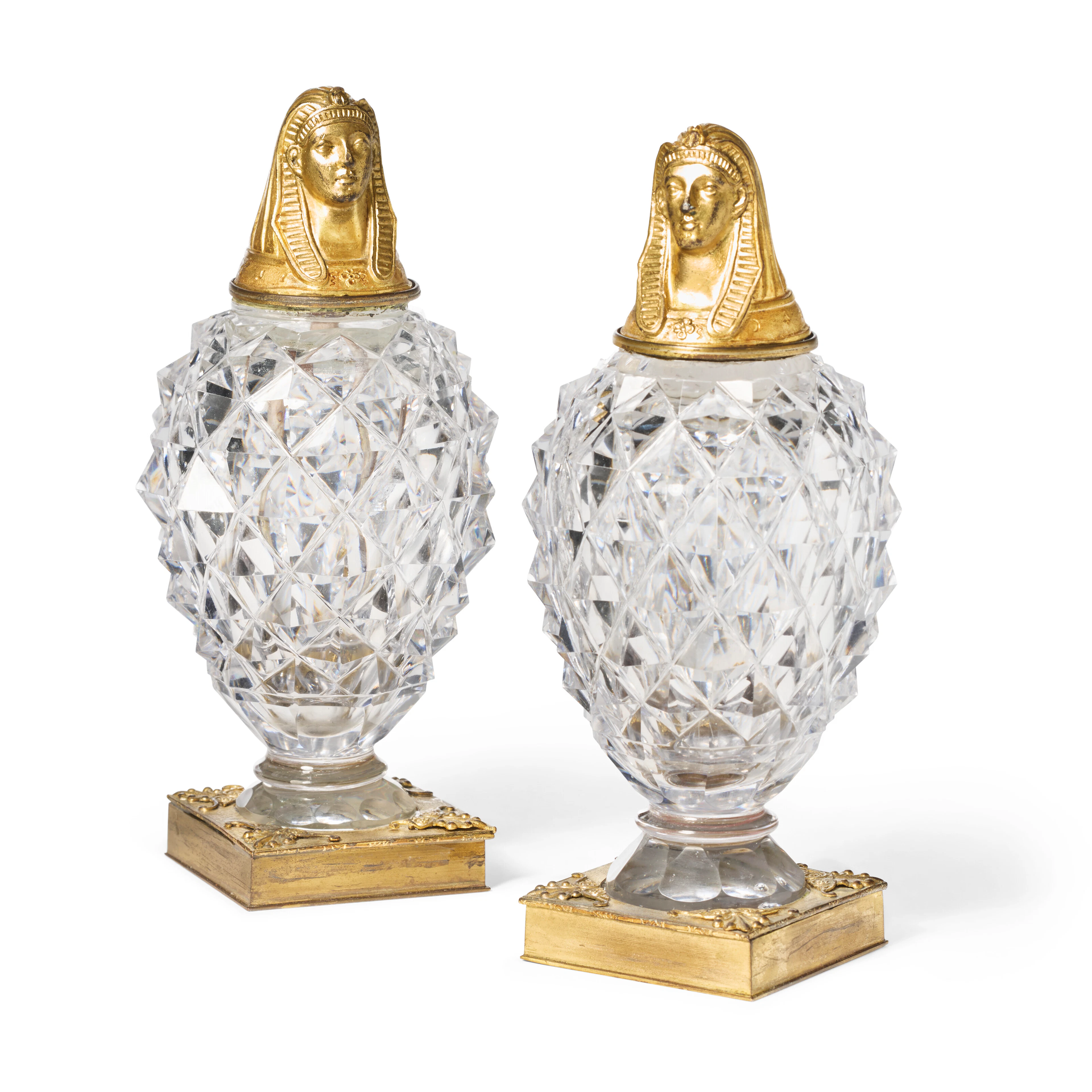 A Pair of North European, Ormolu and Cut Glass Scent Bottles