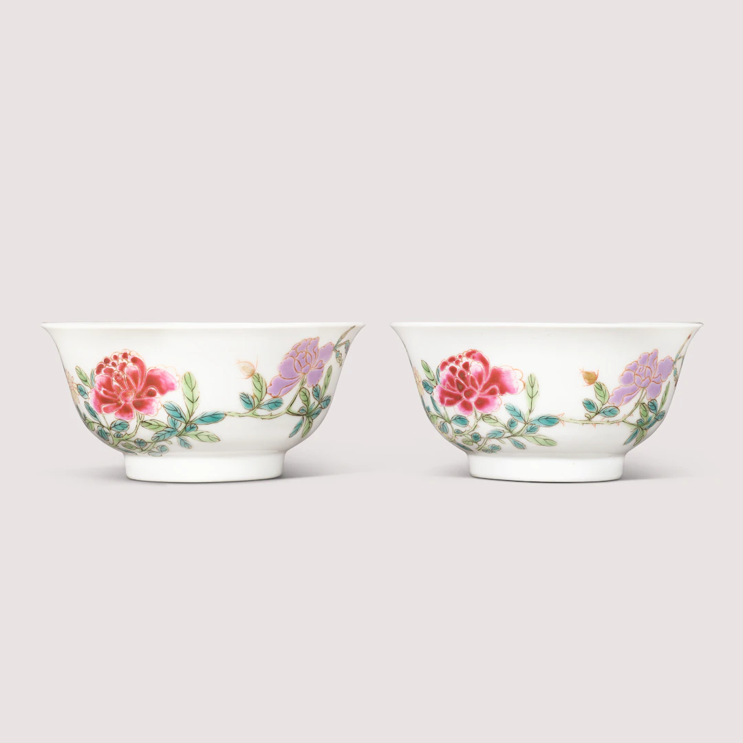A Fine Pair of Famille Rose and Gilt-Decorated ‘Flower and Butterfly’ Bowls