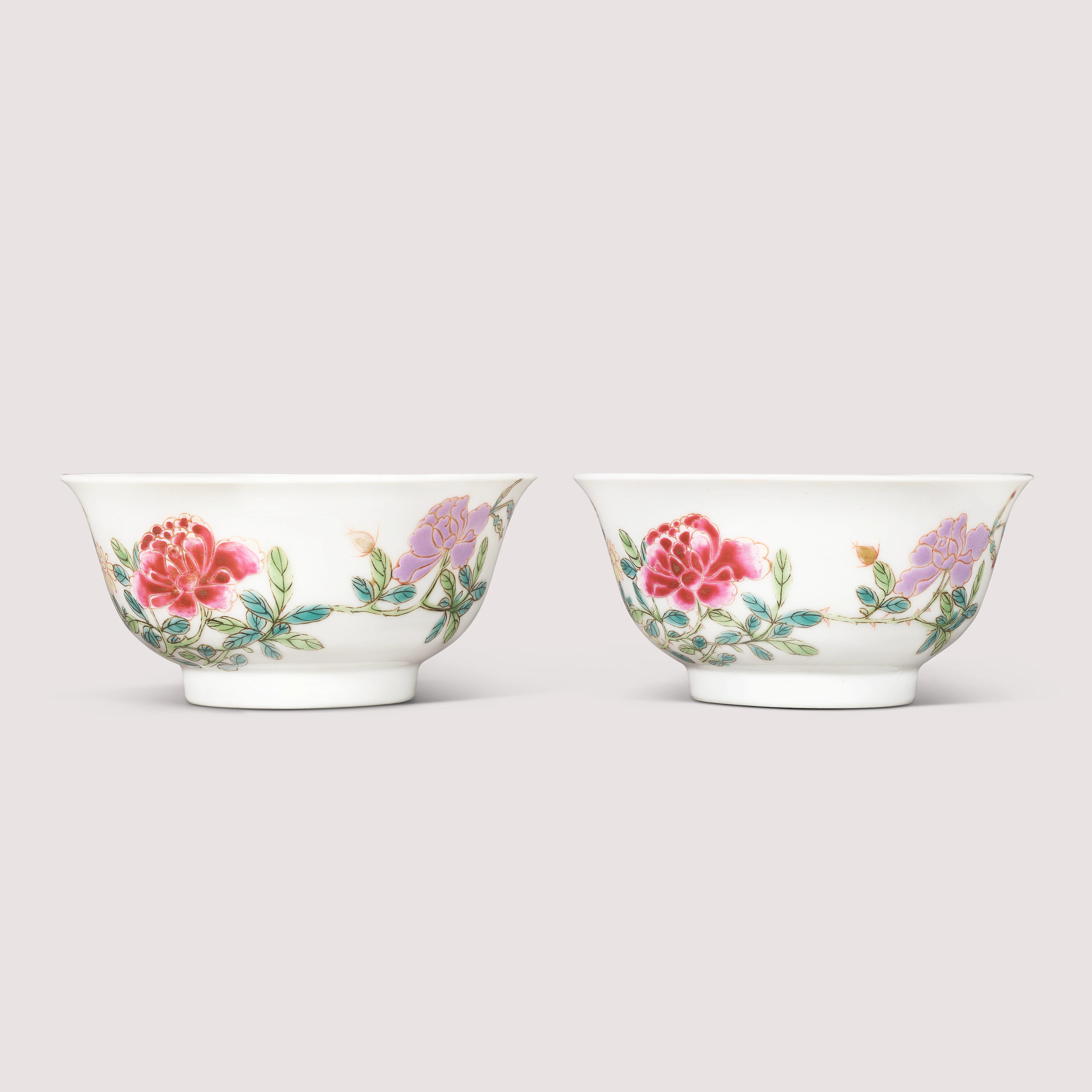 A Fine Pair of Famille Rose and Gilt-Decorated ‘Flower and Butterfly’ Bowls