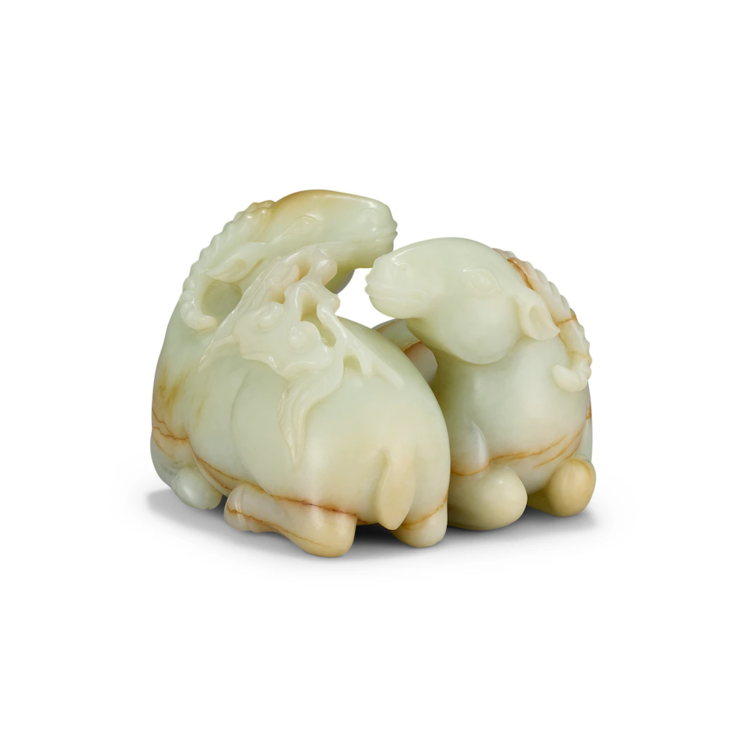 A Celadon Jade Carving of Two Recumbent Rams