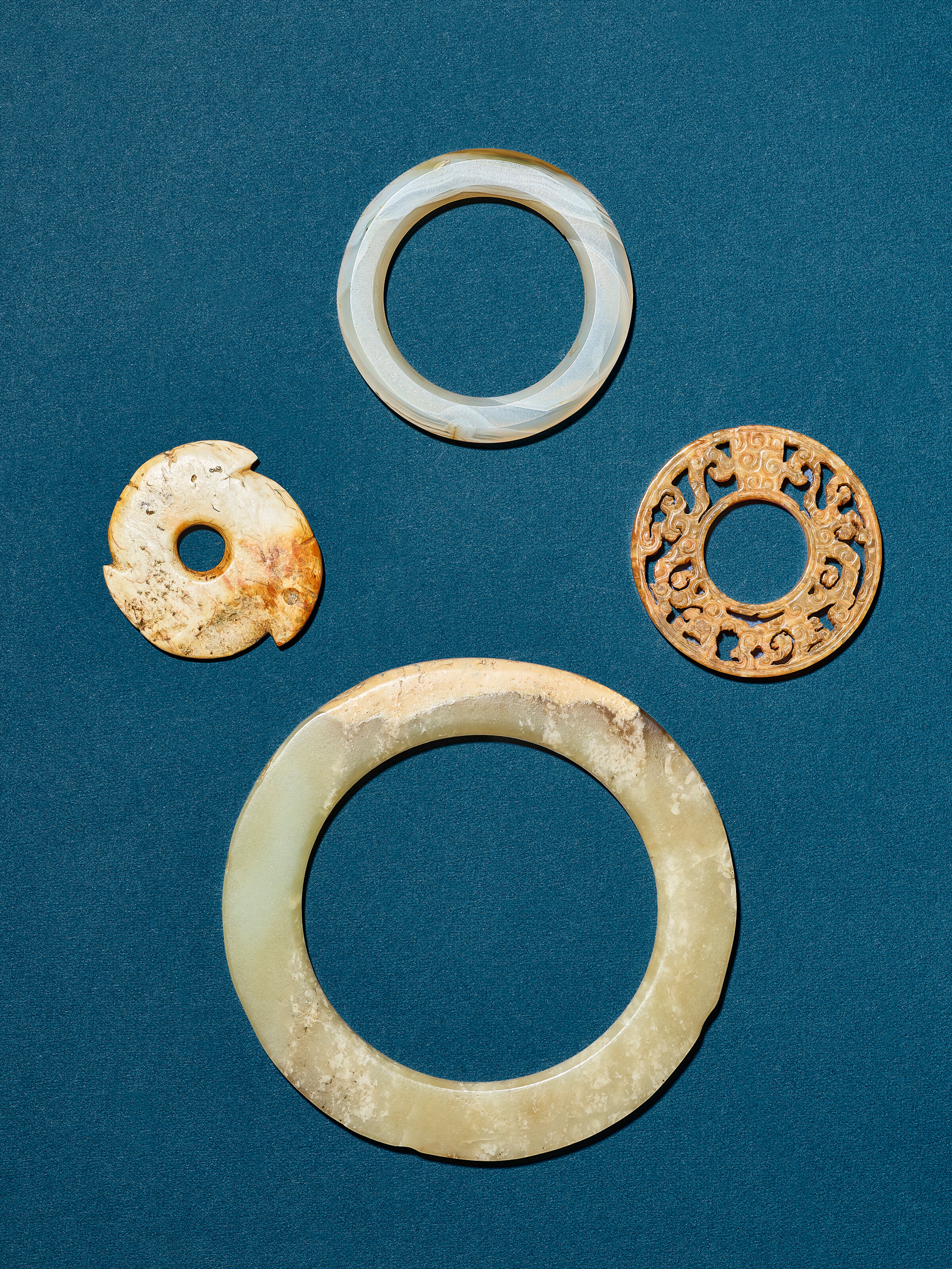 A Group of Three Jade Ornaments and an Agate Ornament