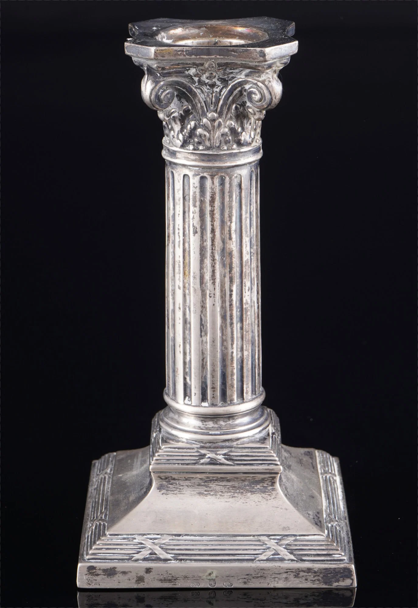 800 silver candlesticks as a corinthian column