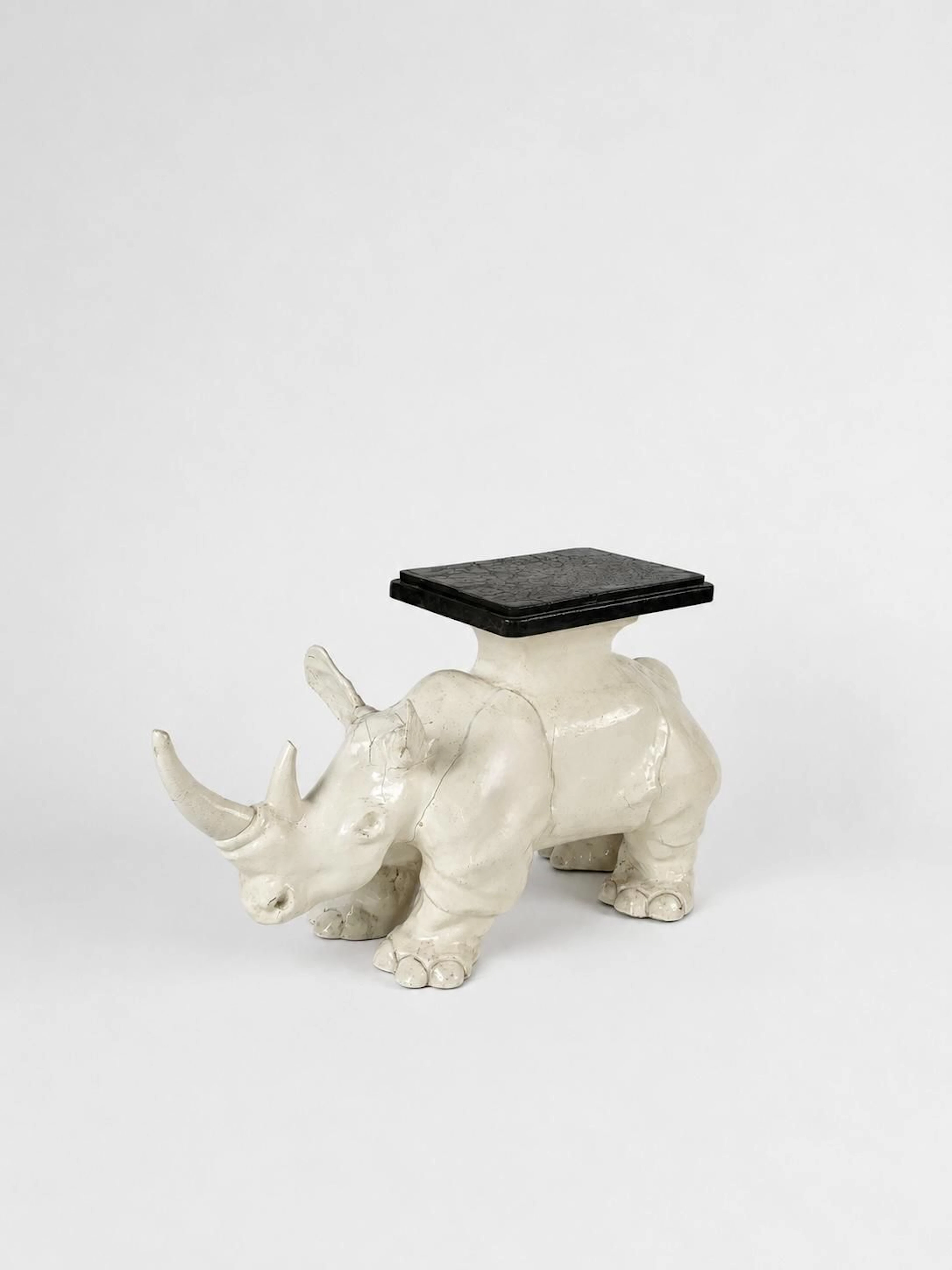 White-lacquered boiled cardboard rhinoceros that can serve a - Lot 85
