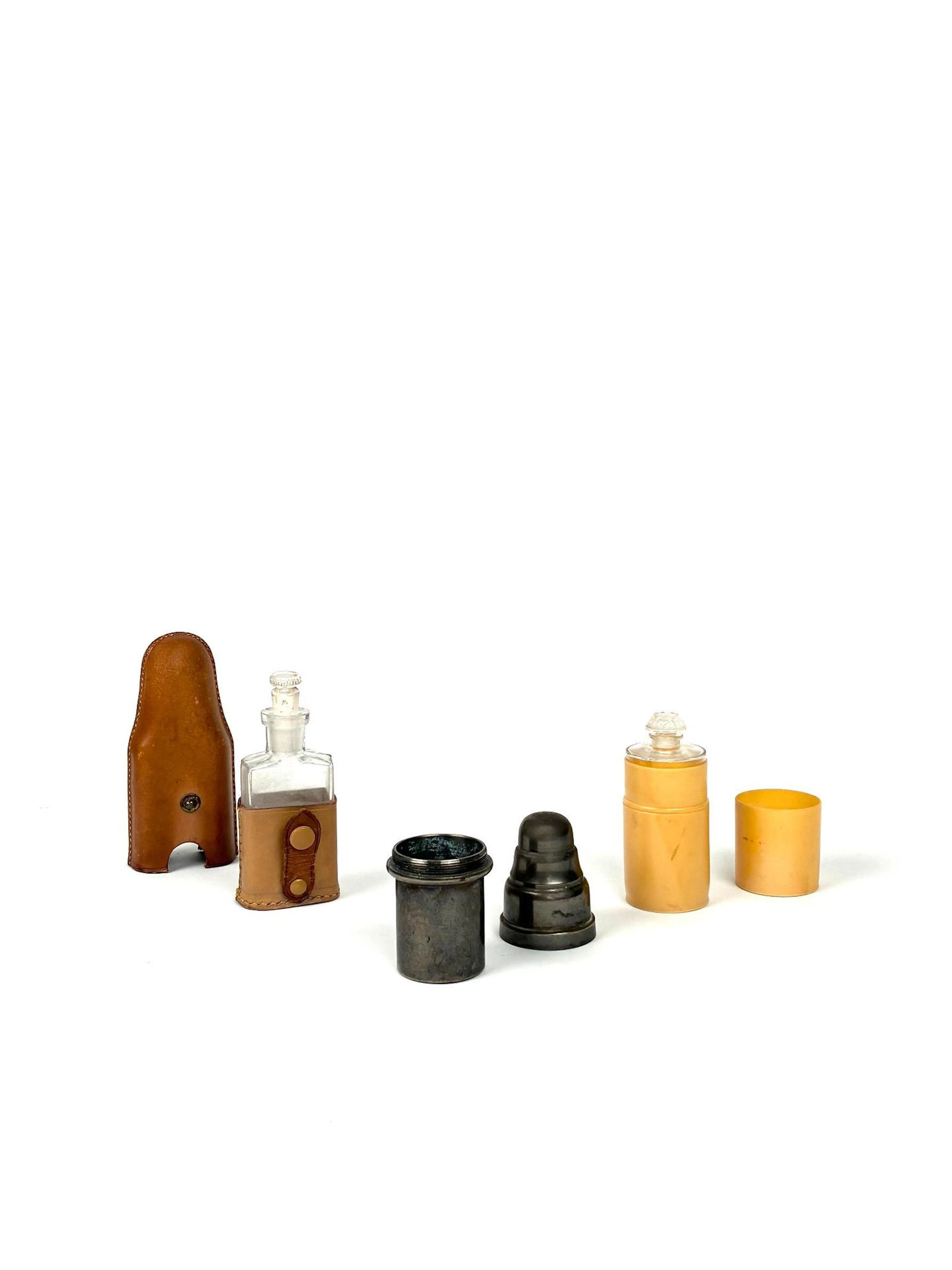 Three bottles of antique travel perfumes - Lot 222