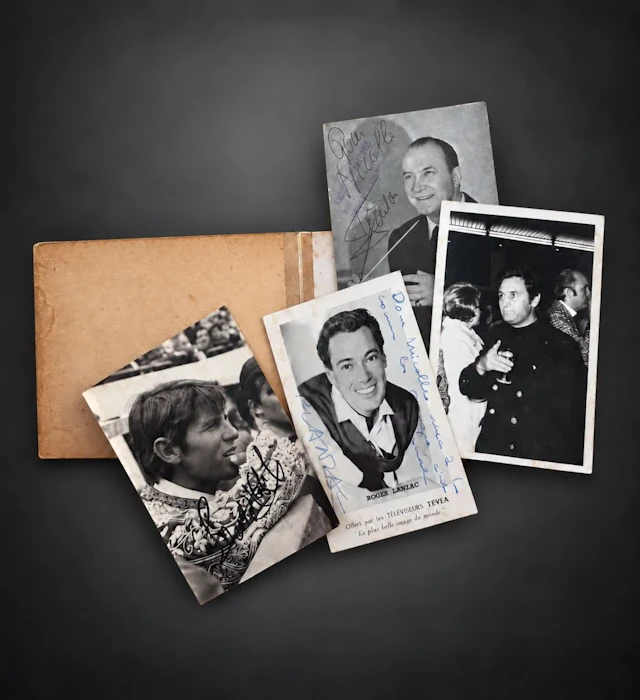 Album containing autographs and various photos, including Ro - Lot 22