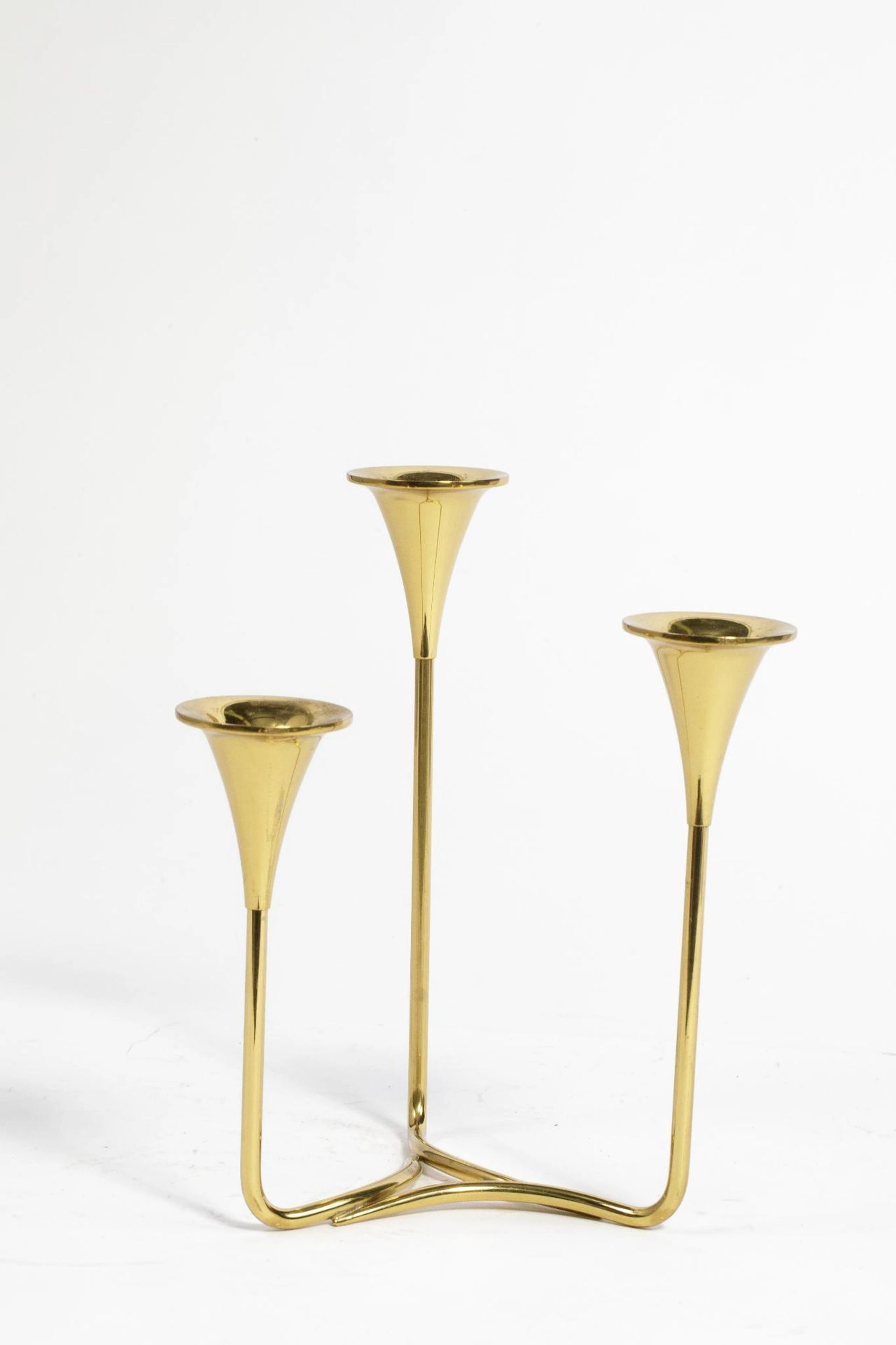 Three-armed candlestick made of gold-colored metal on three - Lot 308