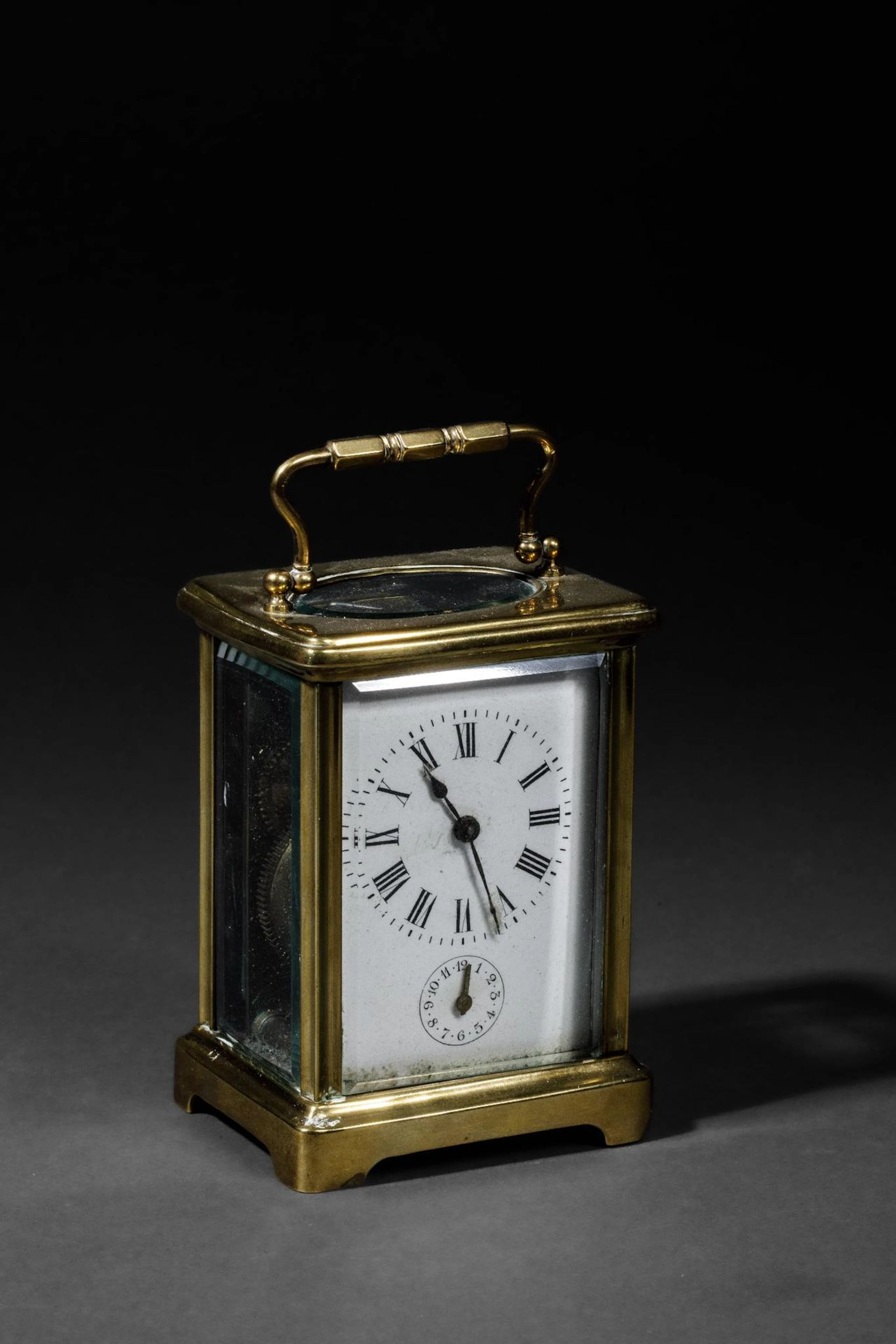 Small travel clock, known as an "officer's clock," made of g - Lot 250