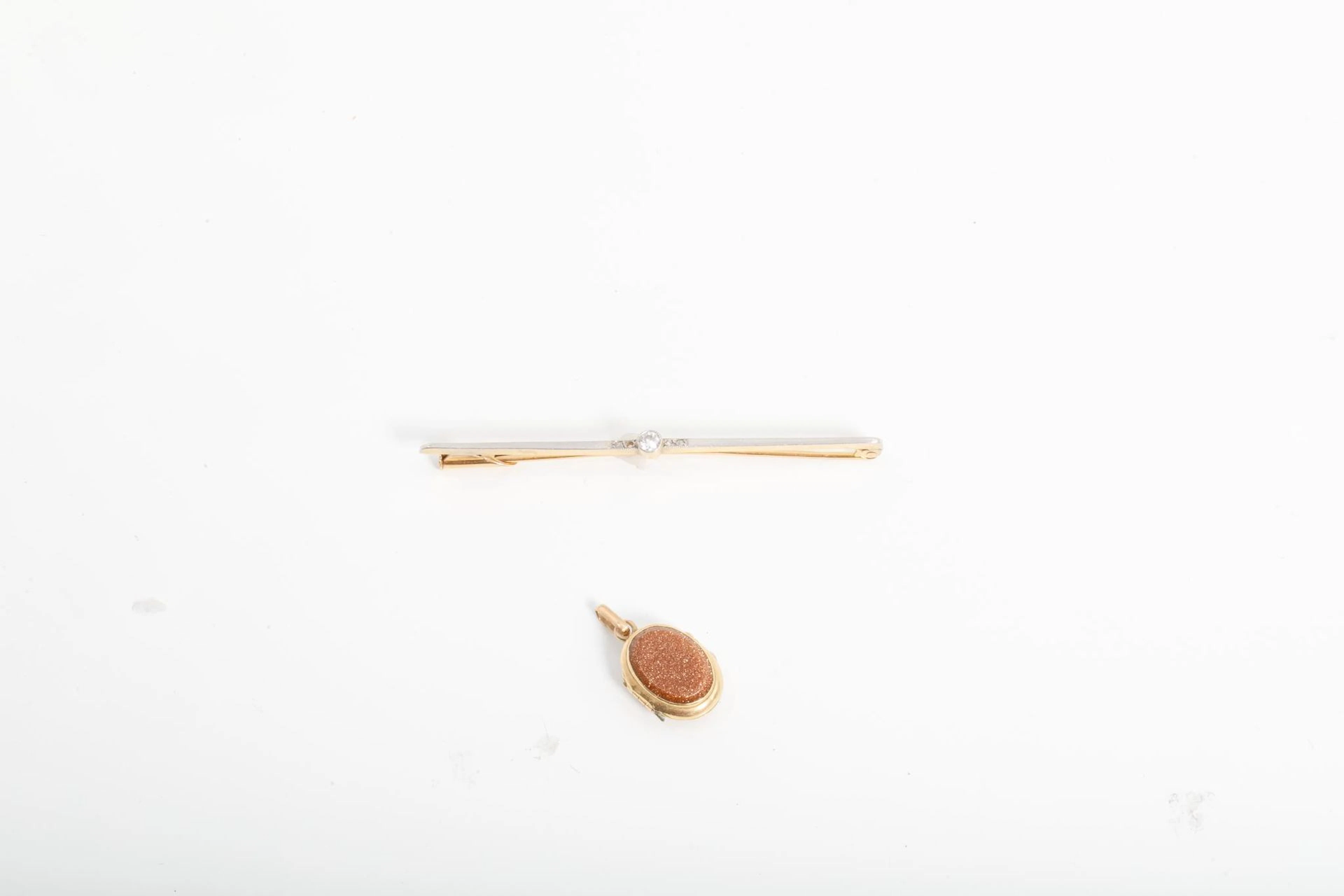 Set consisting of a 750-th yellow gold brooch and a 750-th y - Lot 20