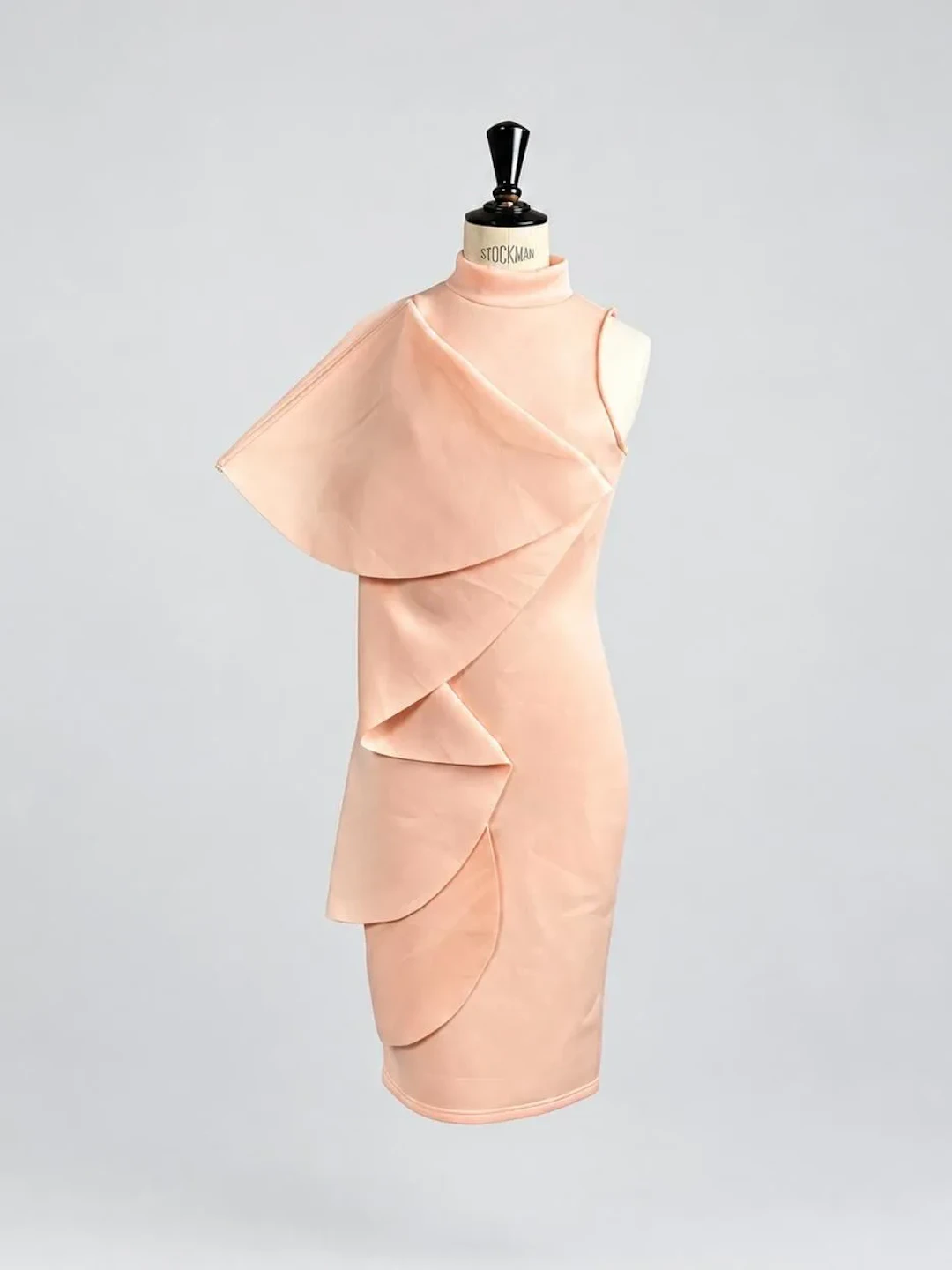 Powder-pink bodycon dress with ruffles cascading from the sh - Lot 42