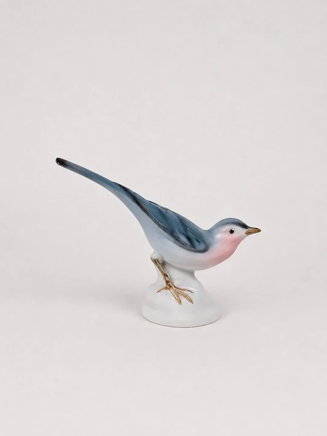 A German porcelain figurine with polychrome glaze depicting - Lot 81
