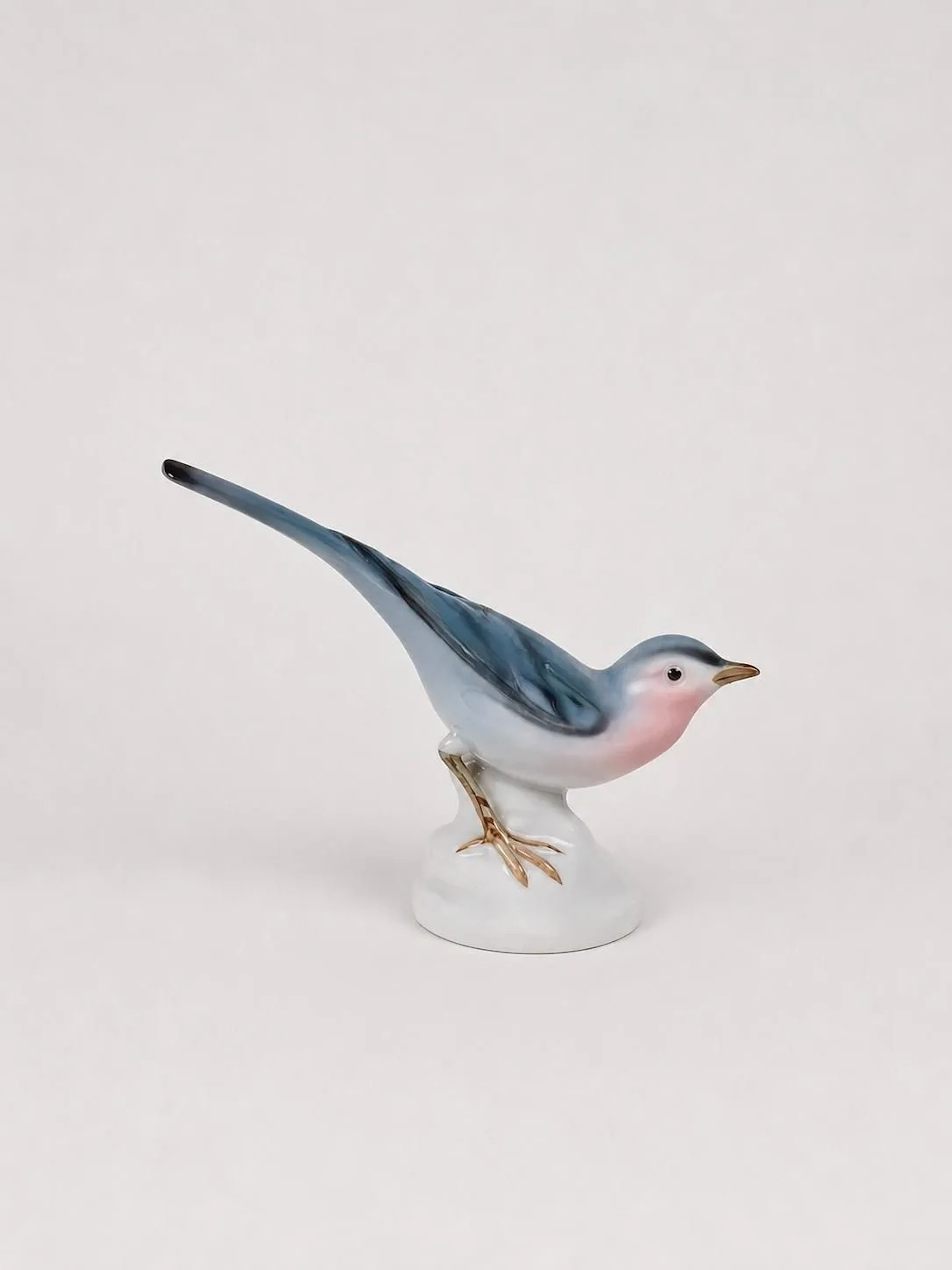 A German porcelain figurine with polychrome glaze depicting - Lot 81