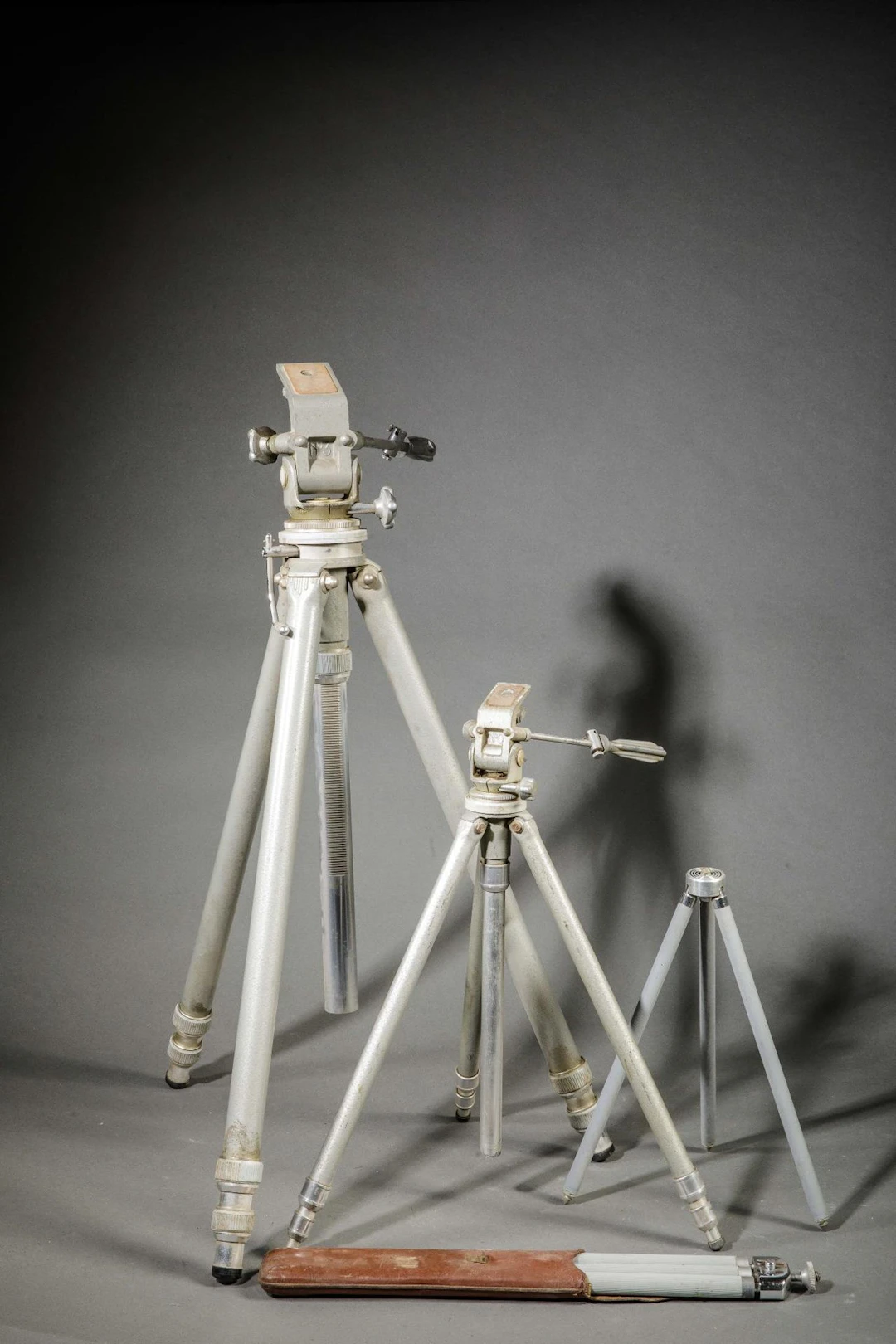 Set of four tripods, including a Gitzo No. 3. - Lot 94