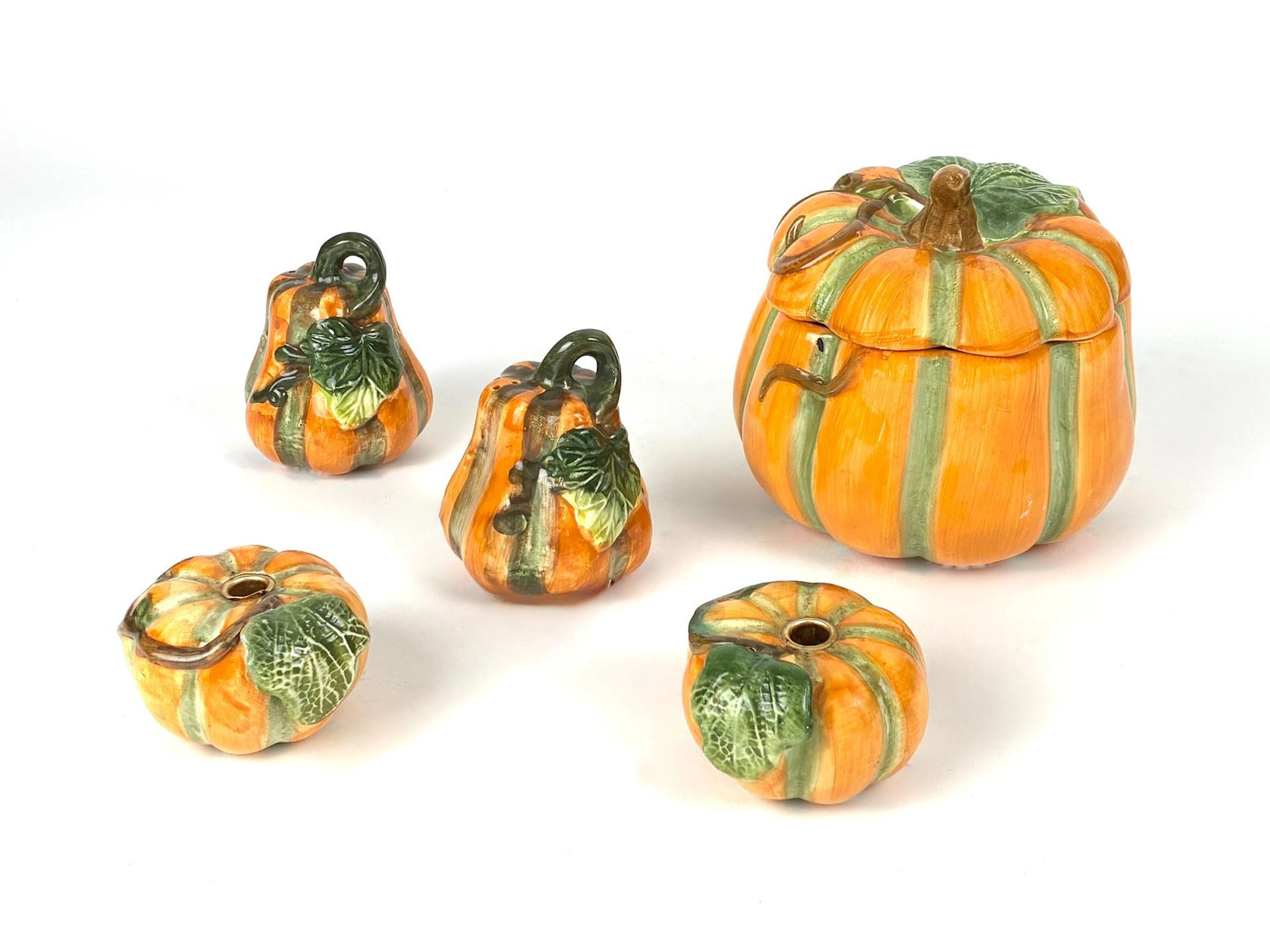 A set of polychrome glazed slipware pieces shaped like coloq - Lot 293