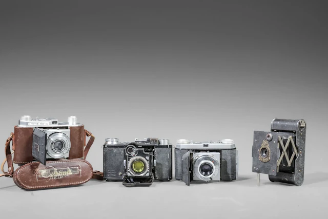 Set of four assorted cameras. Kodak Retina camera body with - Lot 64