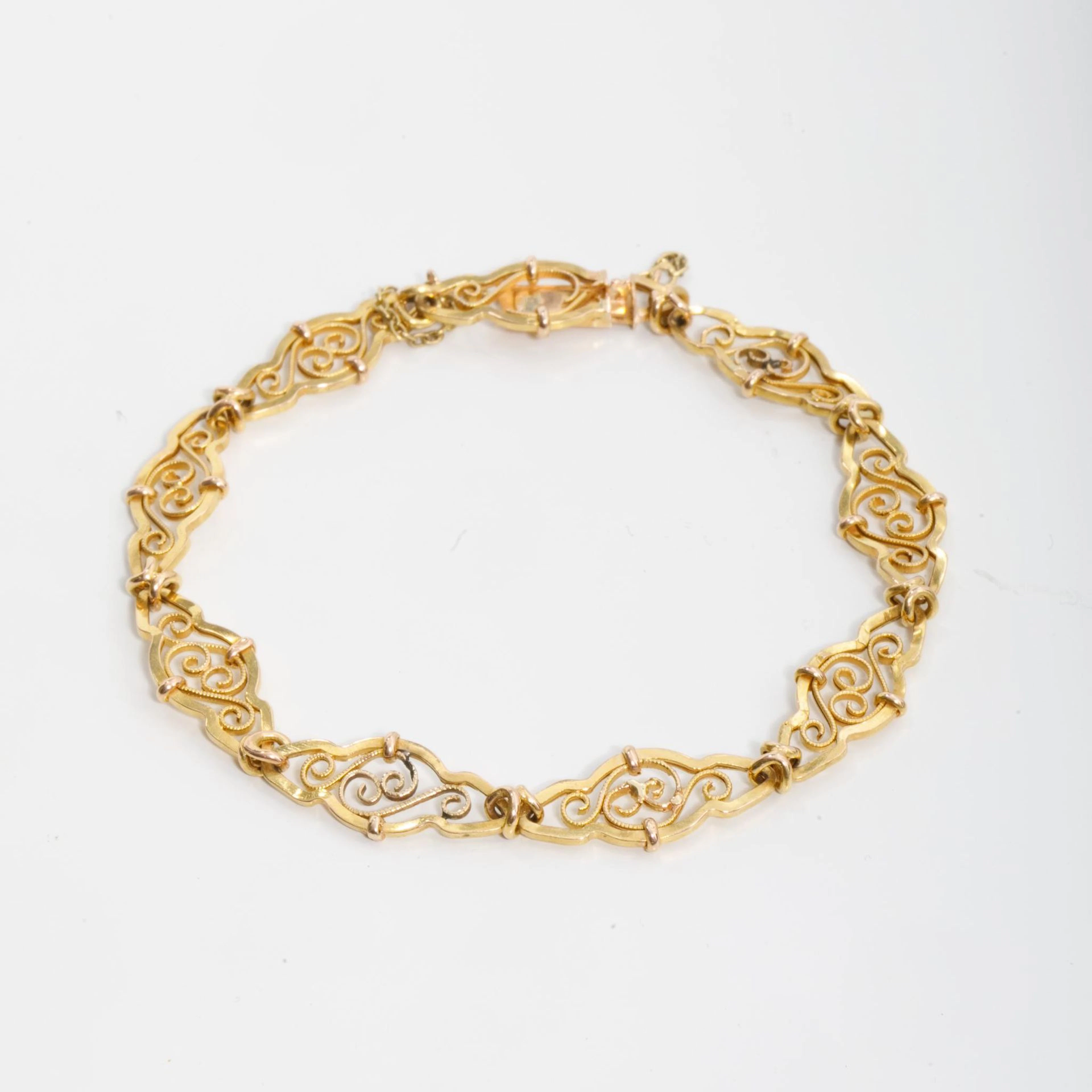 750-th yellow gold bracelet (eagle's head hallmark) consisti - Lot 23