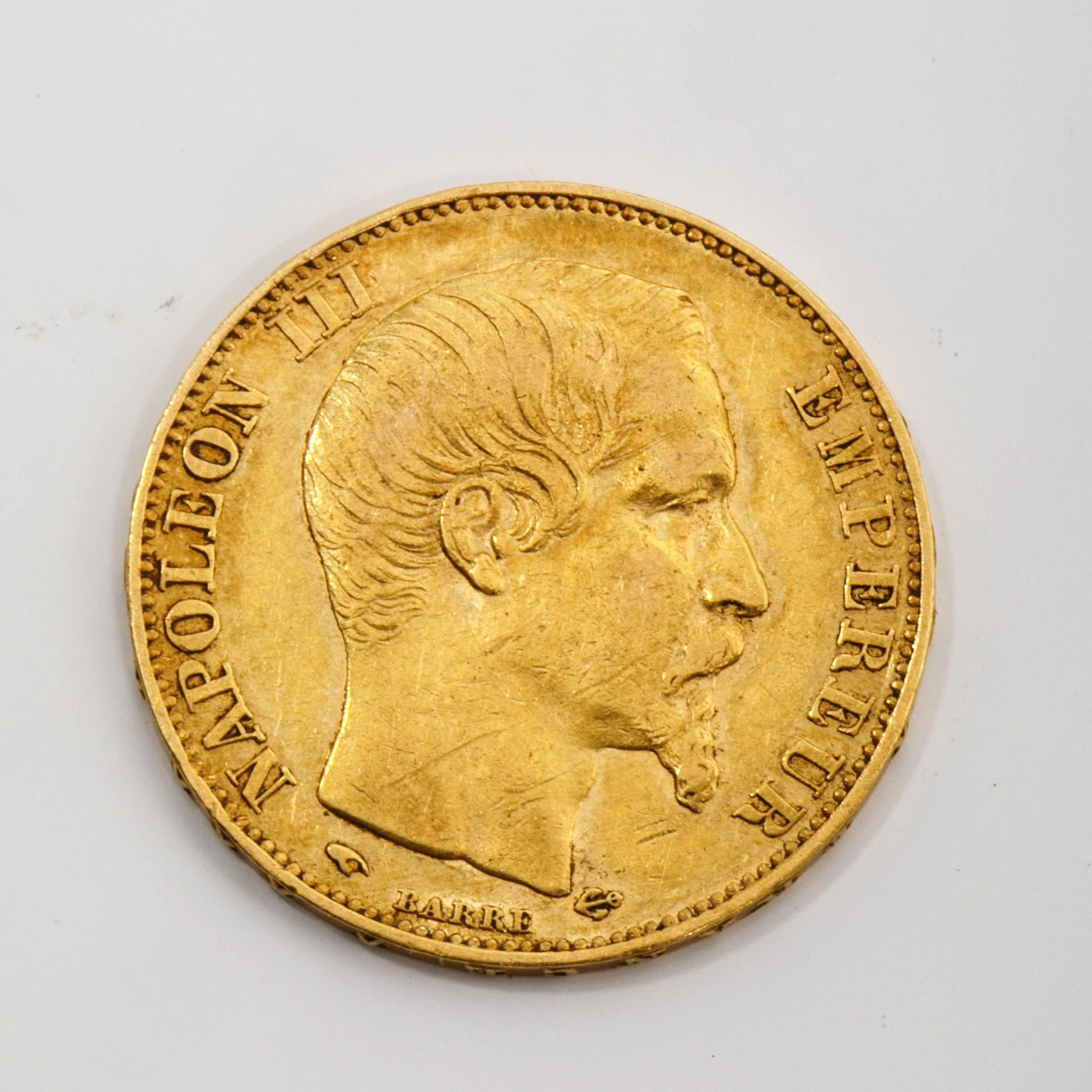 A 1856 Napoleon III bare-headed 20-franc gold coin. Weight: - Lot 8