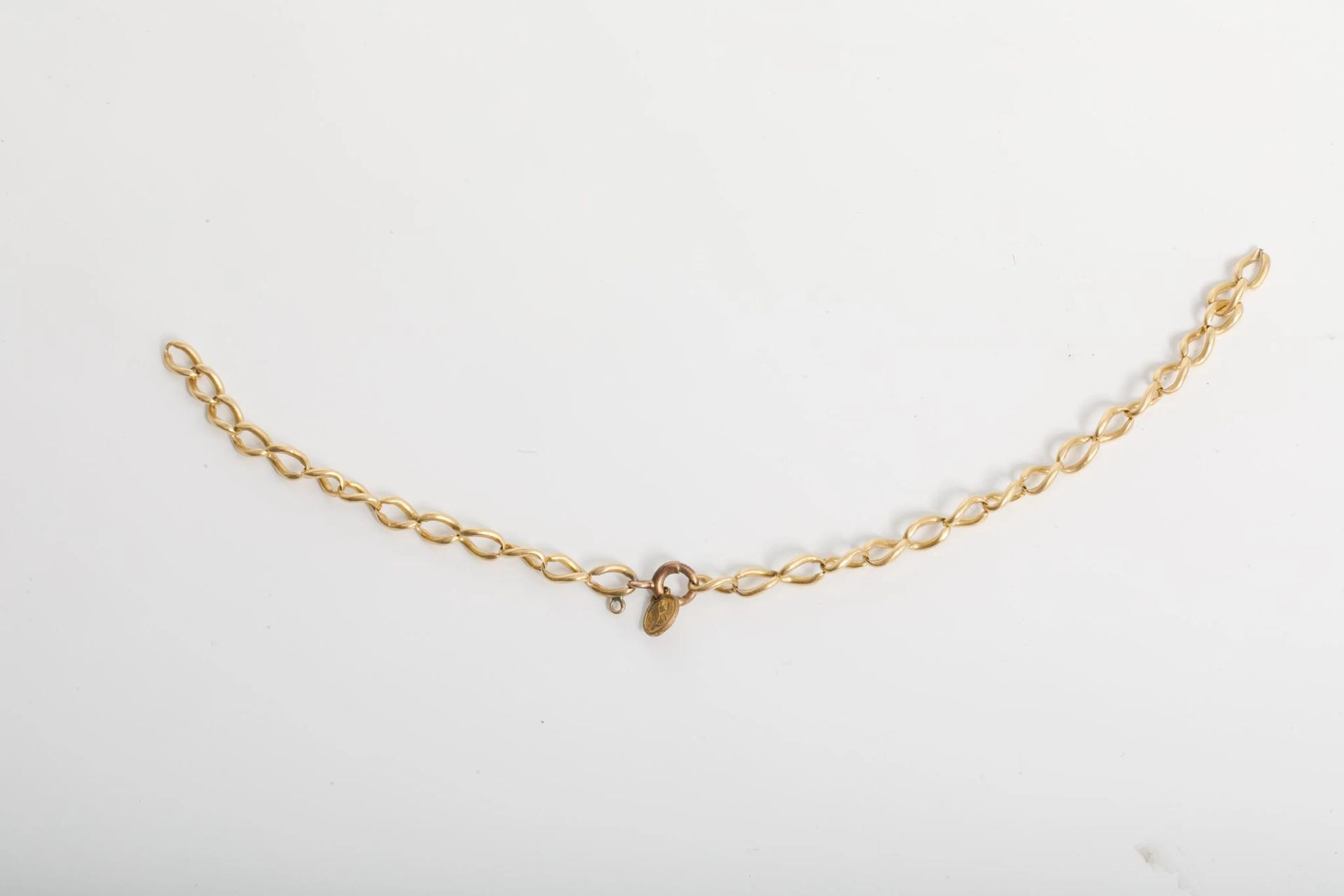 750-thousandths yellow gold chain bracelet - Lot 72