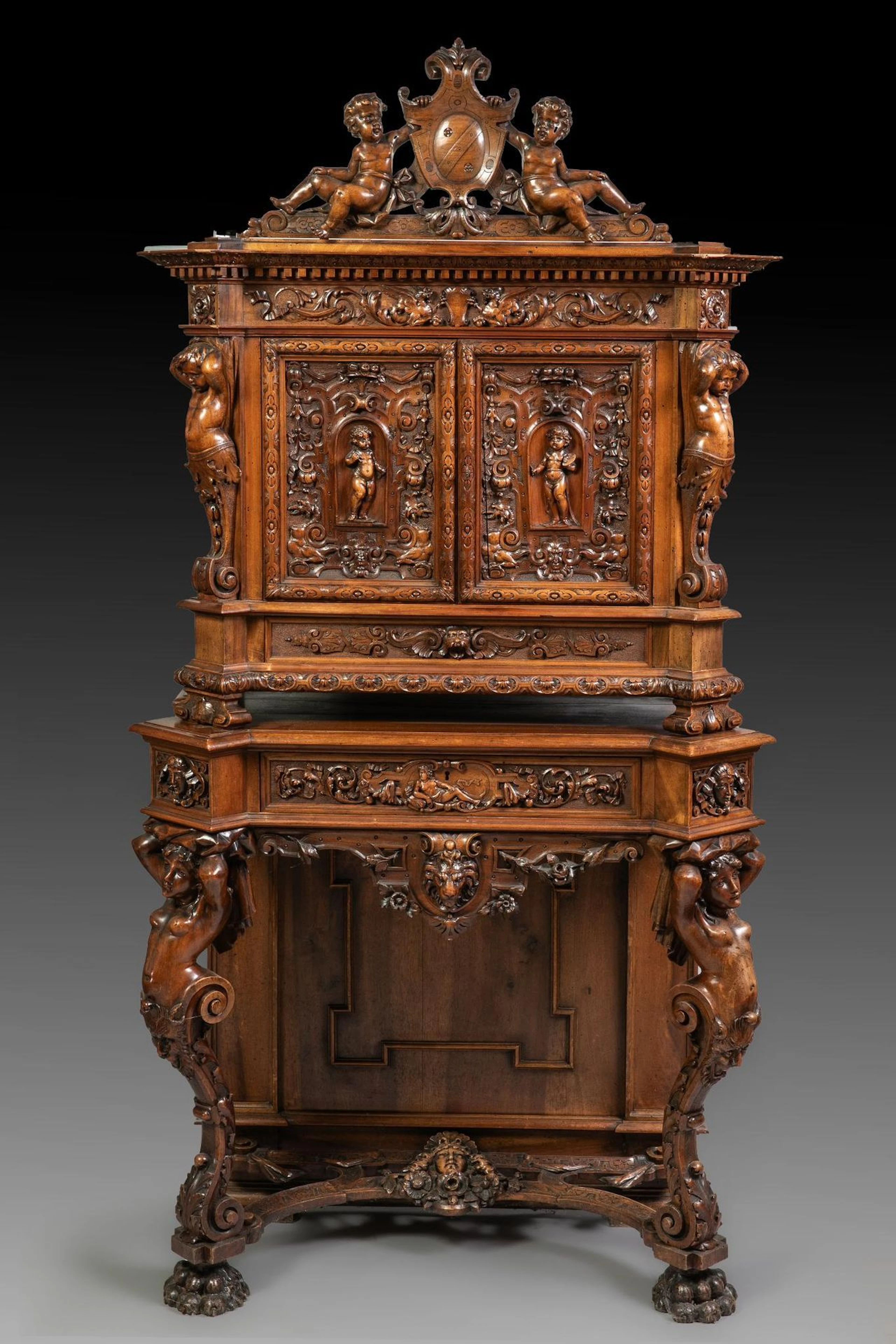 Neo-Renaissance style two-part sideboard in carved wood, the - Lot 80