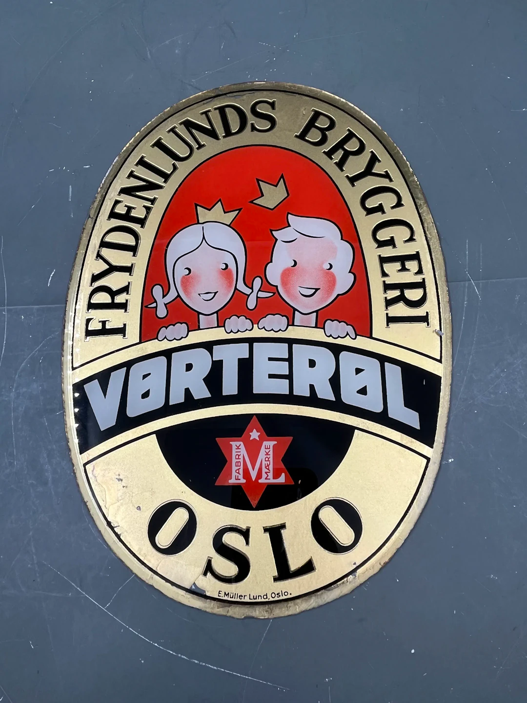 Frydenlunds glassskilt 20-30 tallet