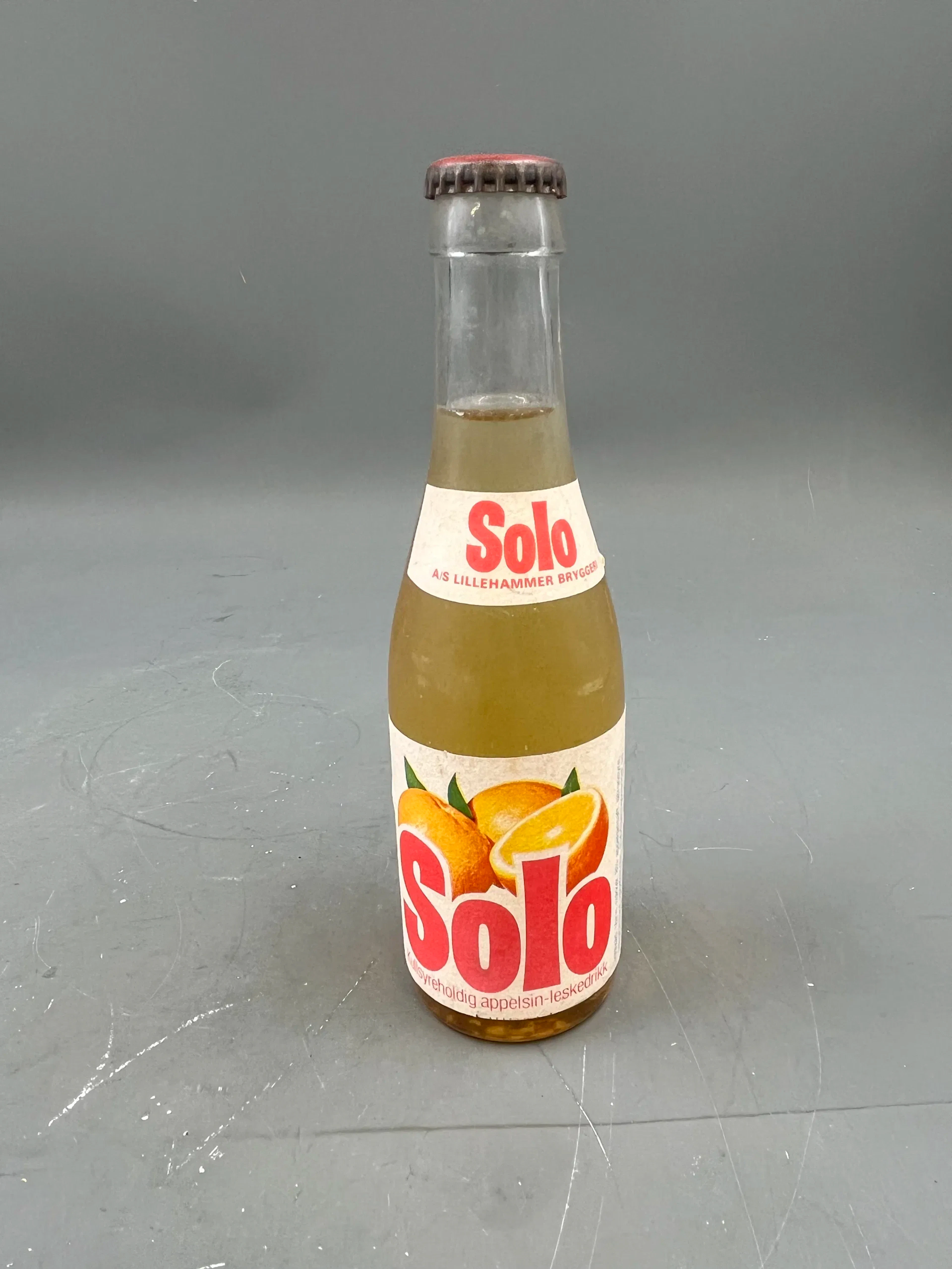 Uåpnet gml solo flaske