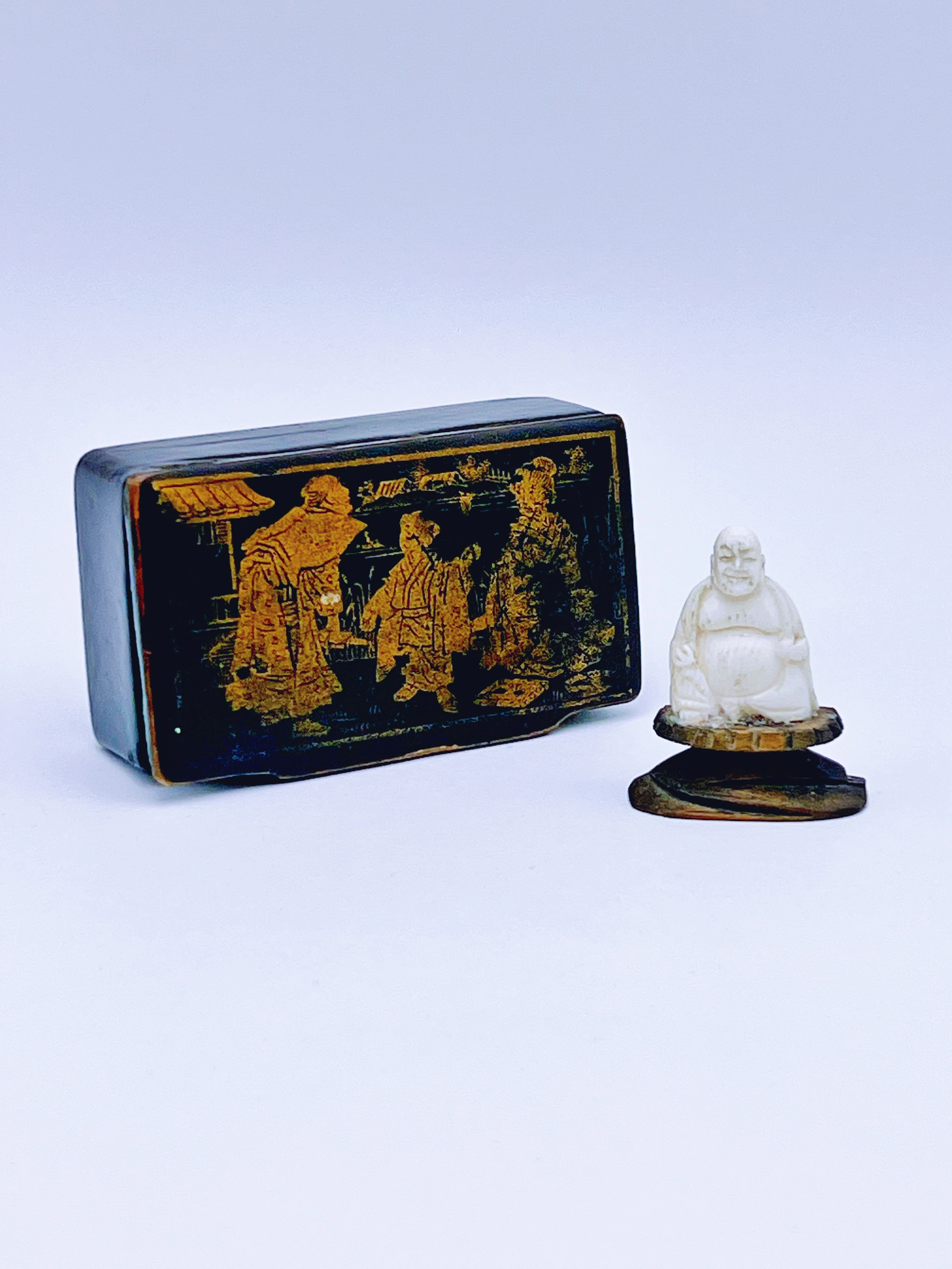 Buddah i elfenben med eske