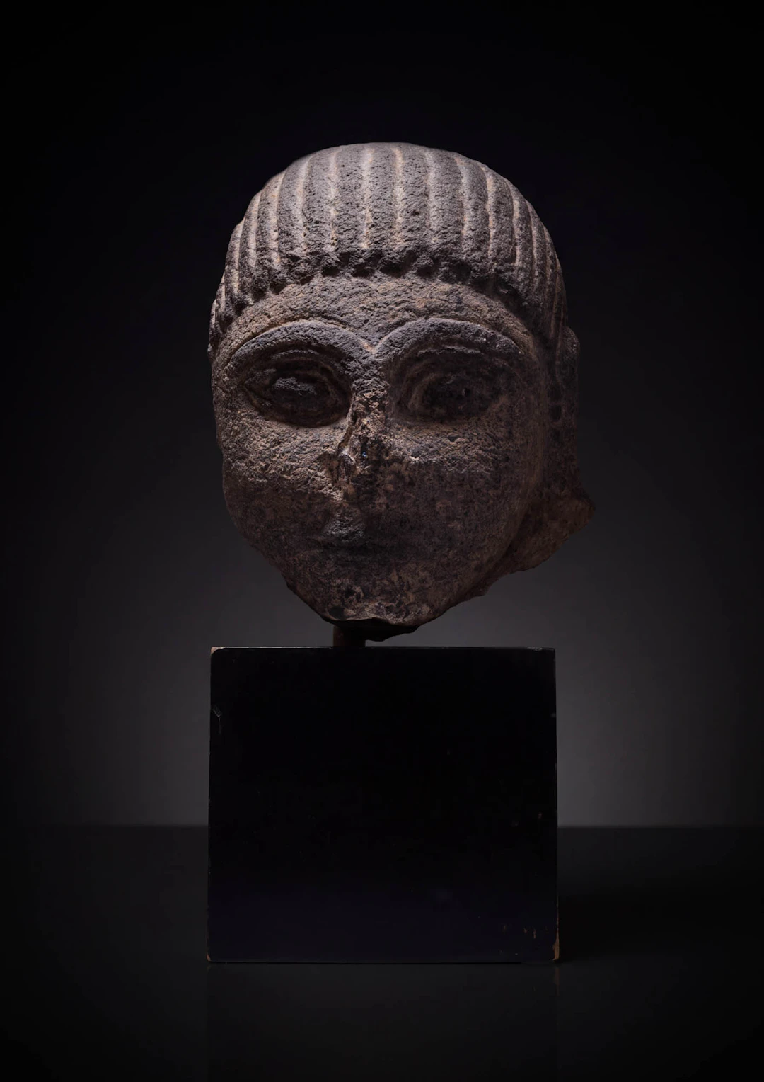 RARE ETRUSCAN NENFRO HEAD OF SPHINX