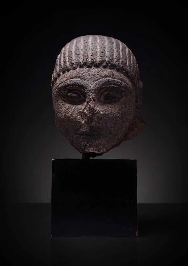 RARE ETRUSCAN NENFRO HEAD OF SPHINX
