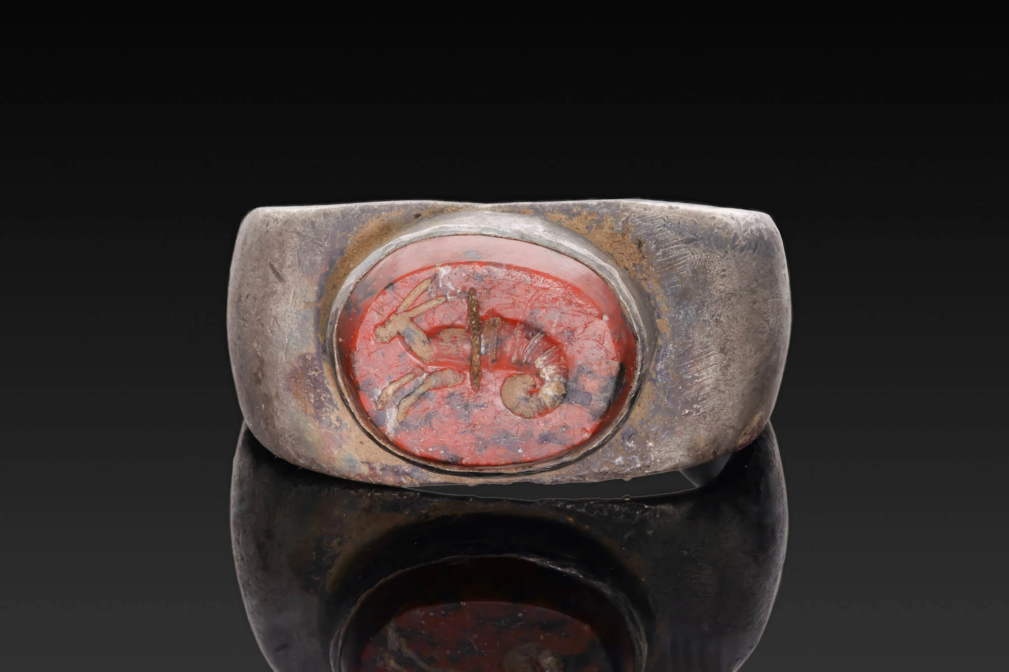 ROMAN RED JASPER INTAGLIO OF A SEA CREATURE IN SILVER RING