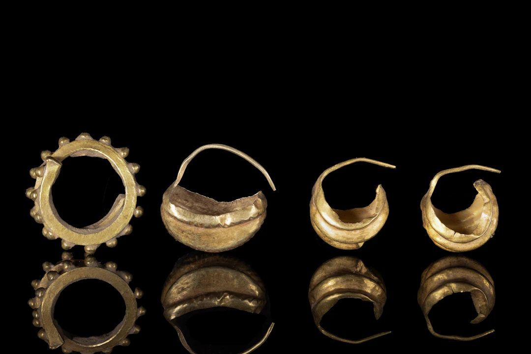 COLLECTION OF GREEK GOLD EARRINGS