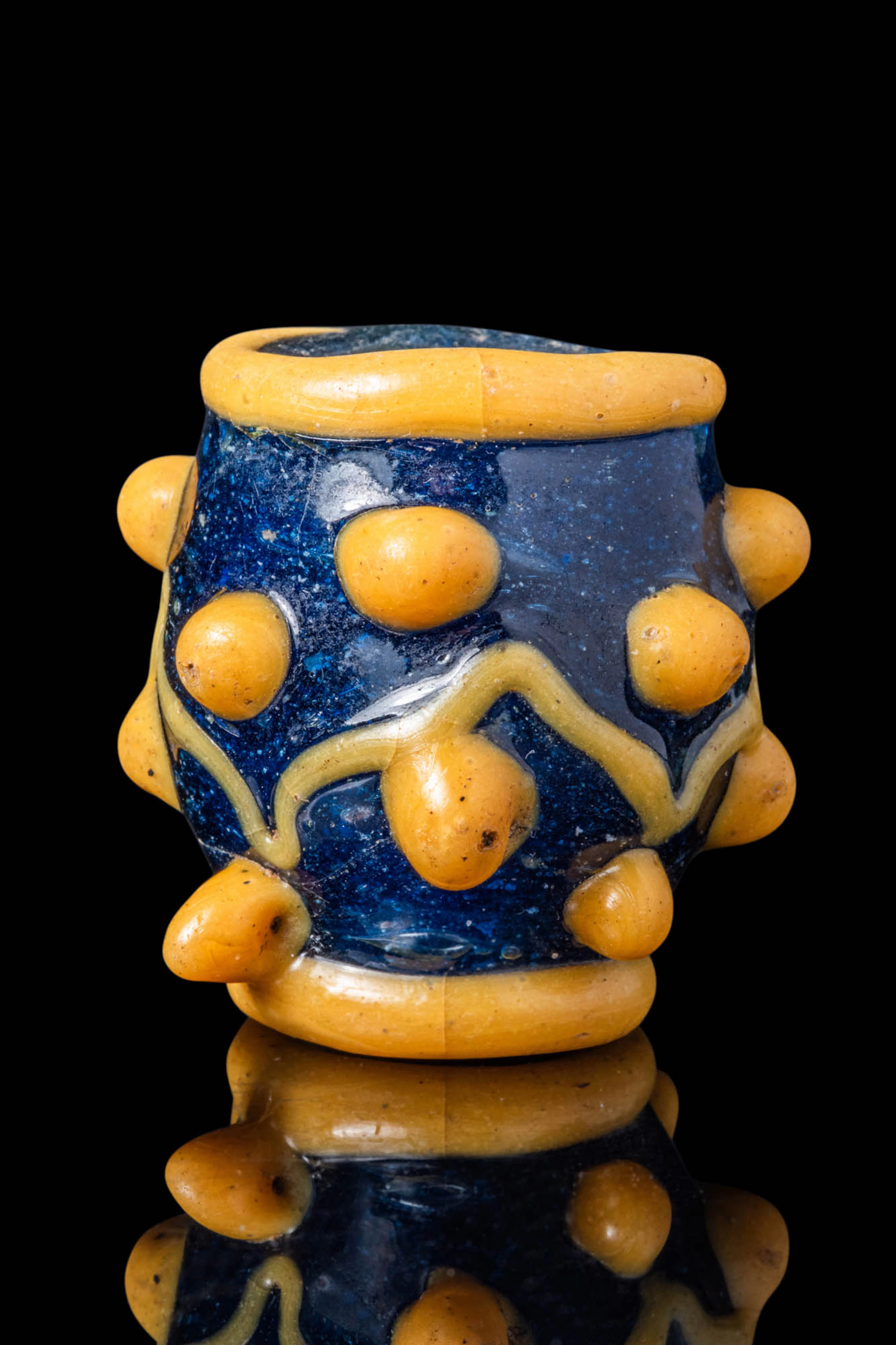 LARGE PHOENICIAN COLOUR GLASS BEAD