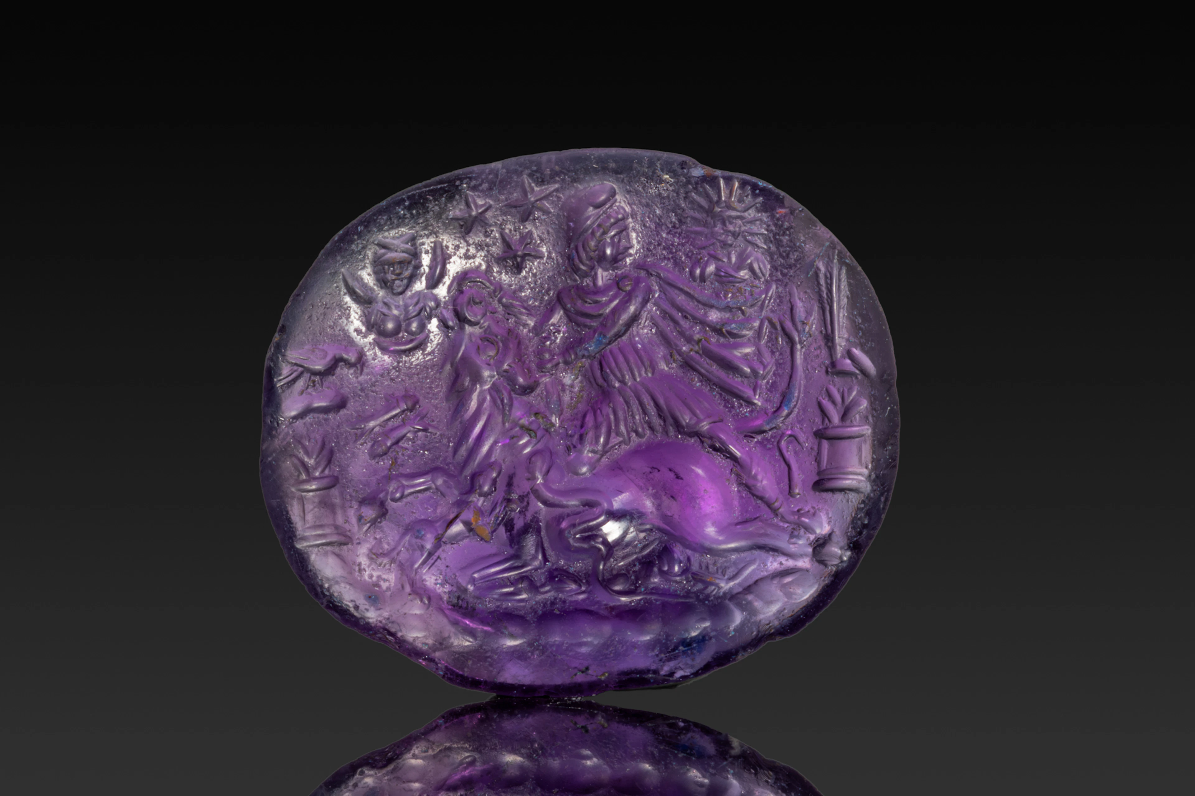 ROMAN AMETHYST INTAGLIO WITH TAUROCTONY - MITHRAS SLAYING THE BULL