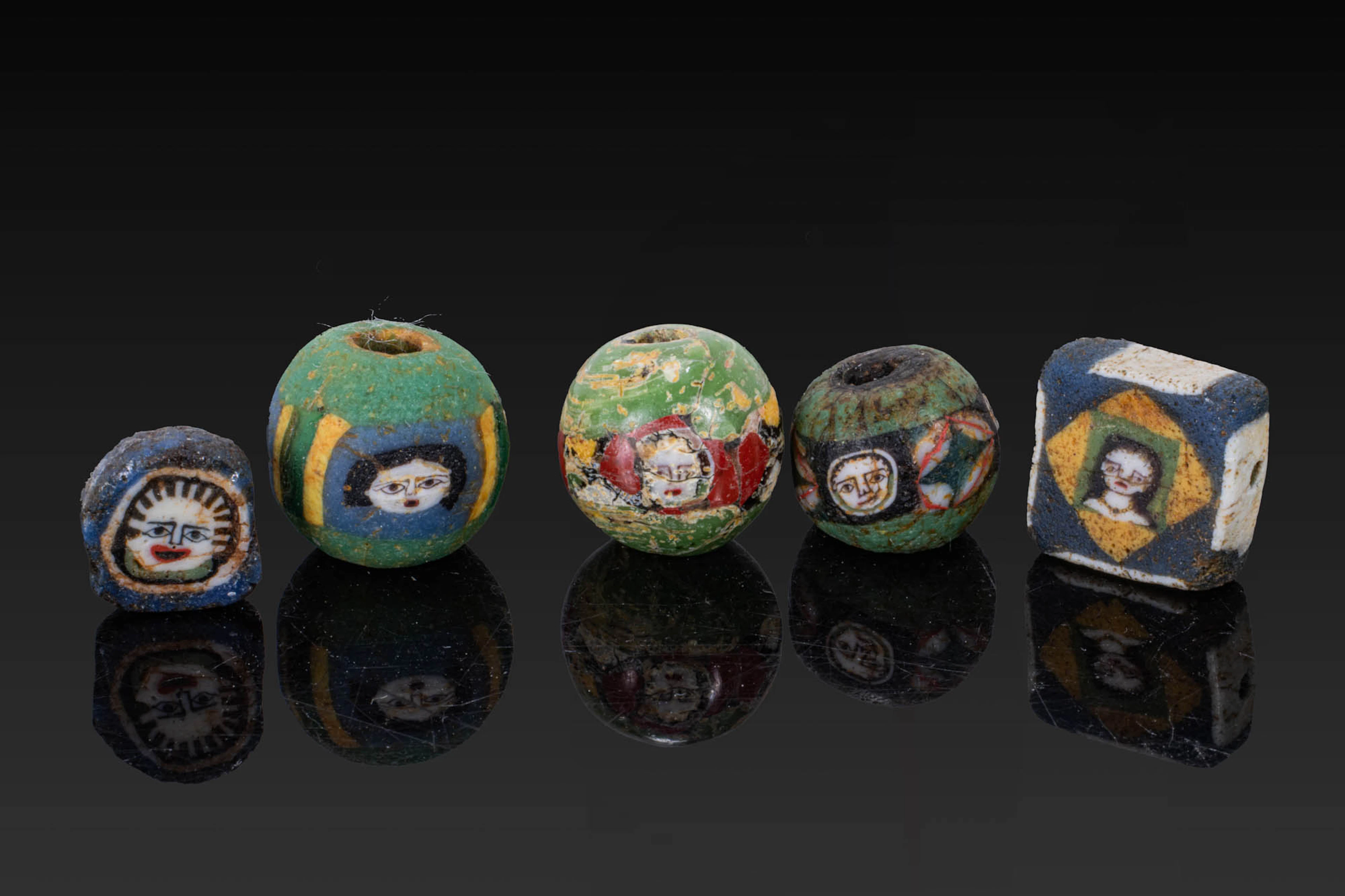 COLLECTION OF ROMAN MOSAIC GLASS BEADS WITH FACES