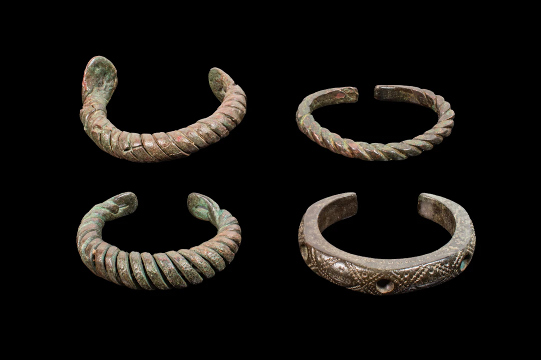 COLLECTION OF CELTIC BRONZE BANGLES