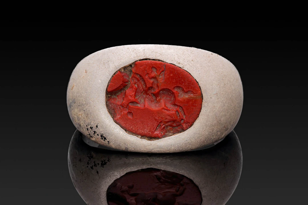 ROMAN SILVER RING WITH INTAGLIO OF CUPID ON HORSEBACK